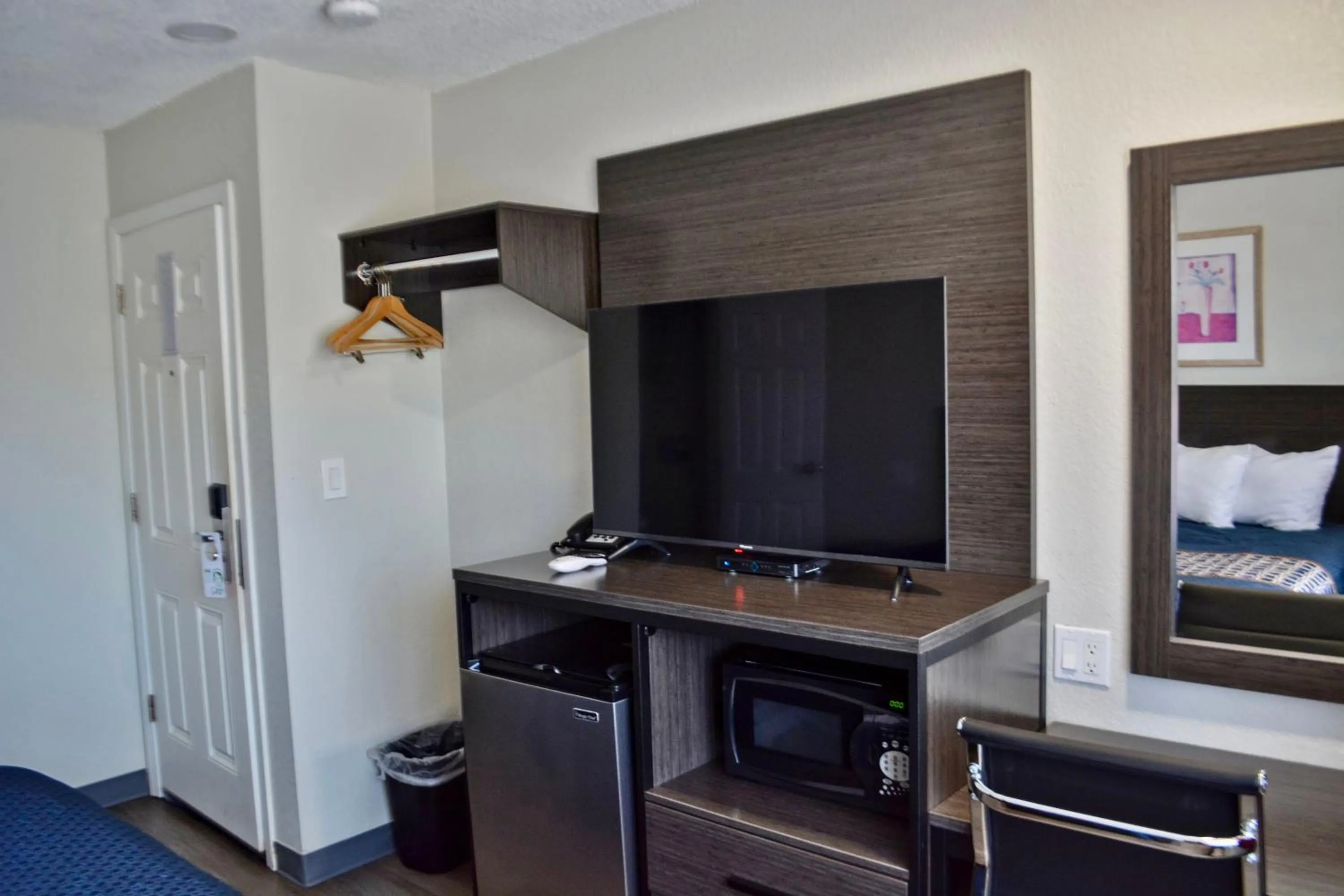 TV and multimedia in The Maverick Motel, Main Street USA Collection by PNW Hospitality