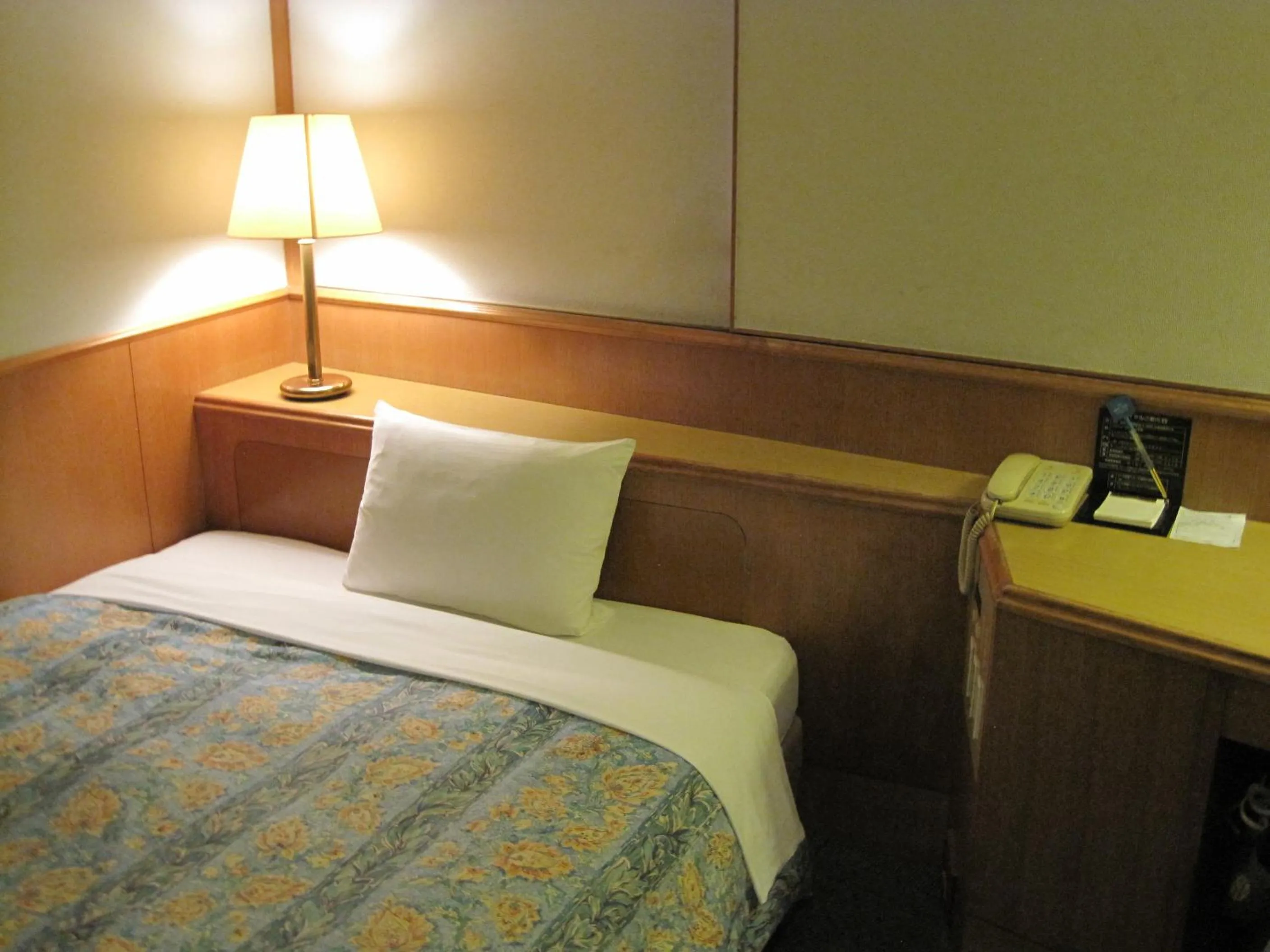 Bed in Hyuga Dai-ichi Hotel