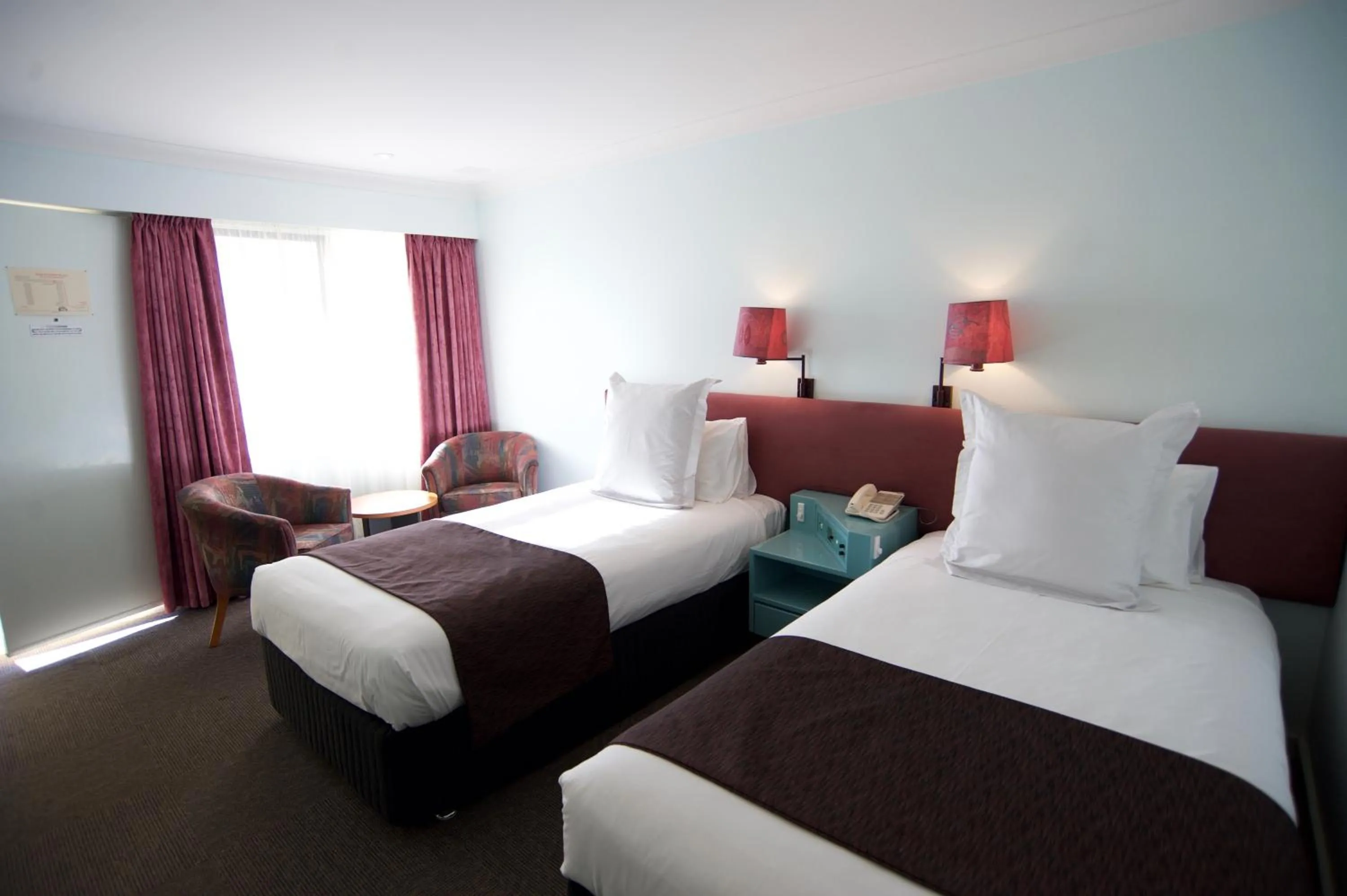 Bed in SureStay Hotel by Best Western The Clarence on Melville