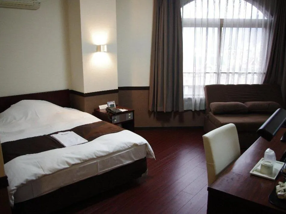 Bed in Hotel Saint Paul Nagasaki