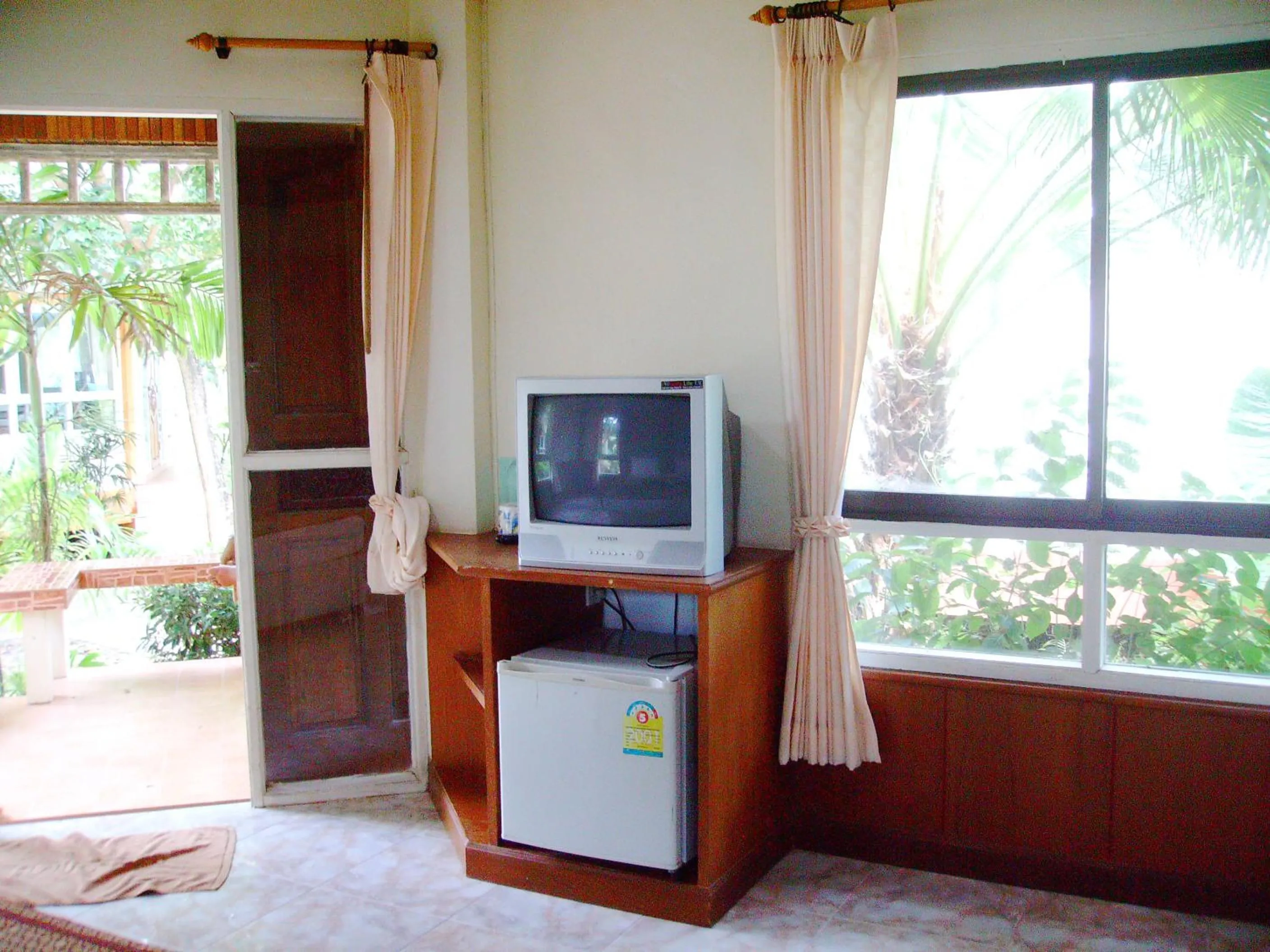 TV and multimedia in Lanta Palm Beach Resort , Beach Bungalow - Koh Lanta