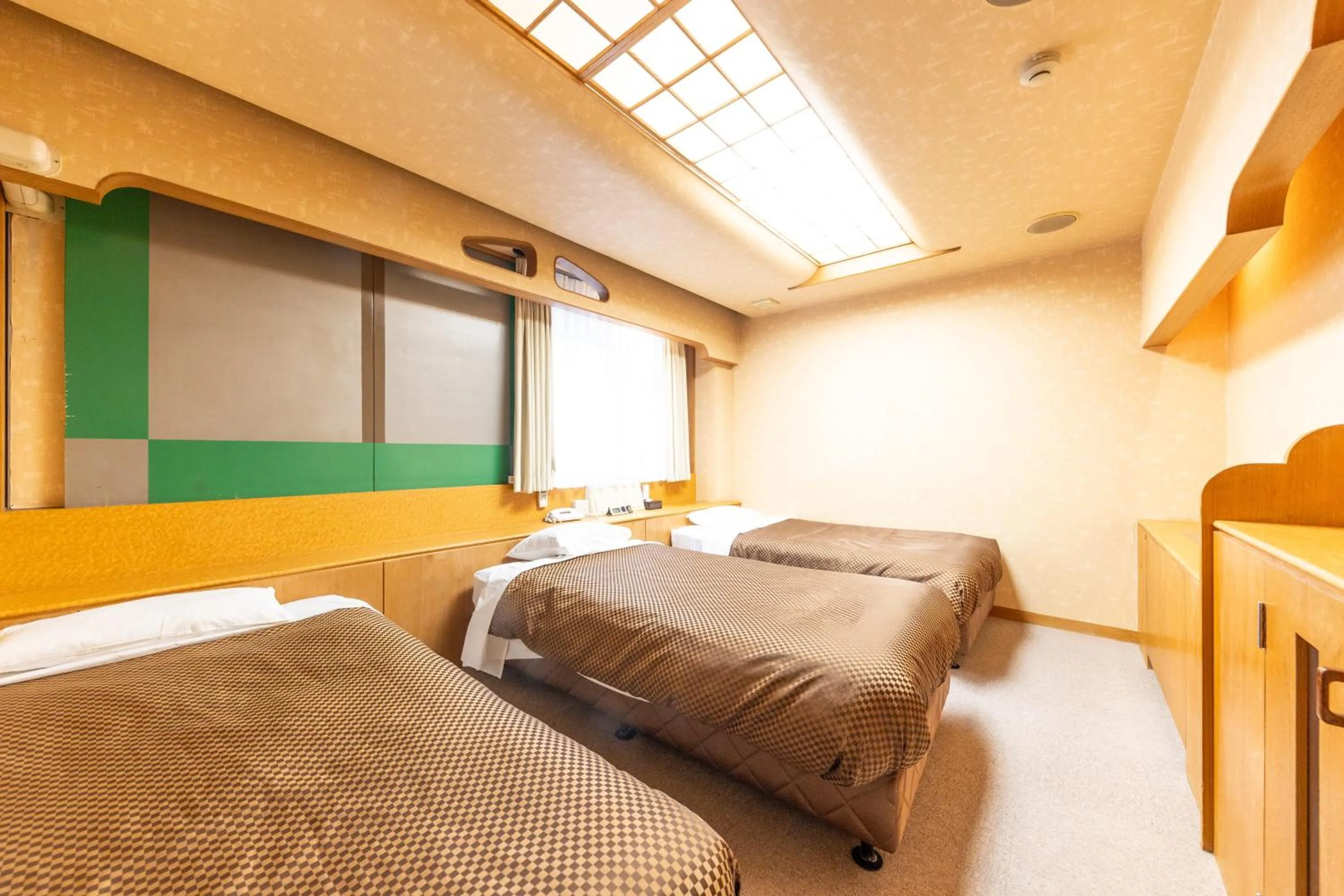 Bed in Reco Hotel Mikuni