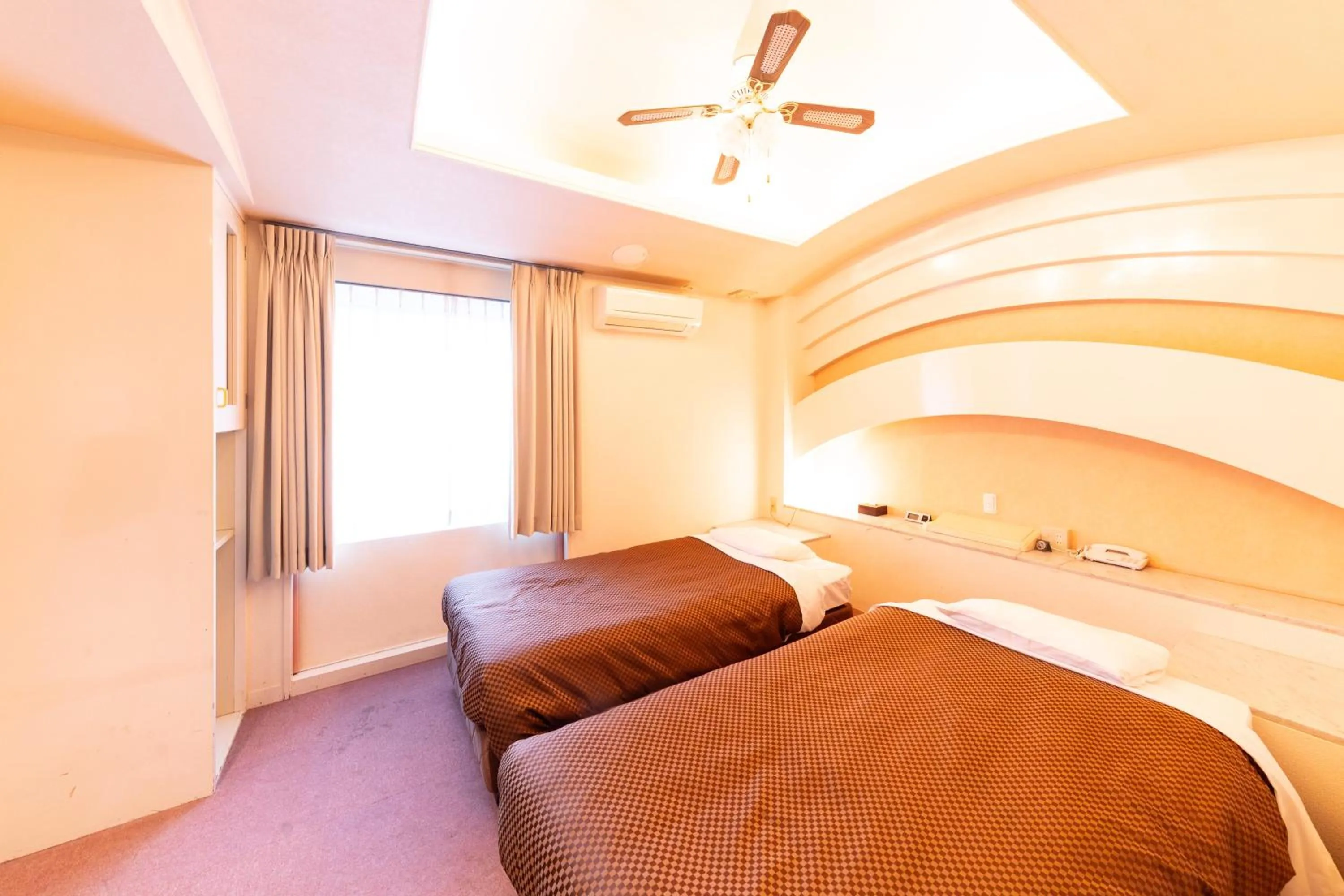 Bed in Reco Hotel Mikuni