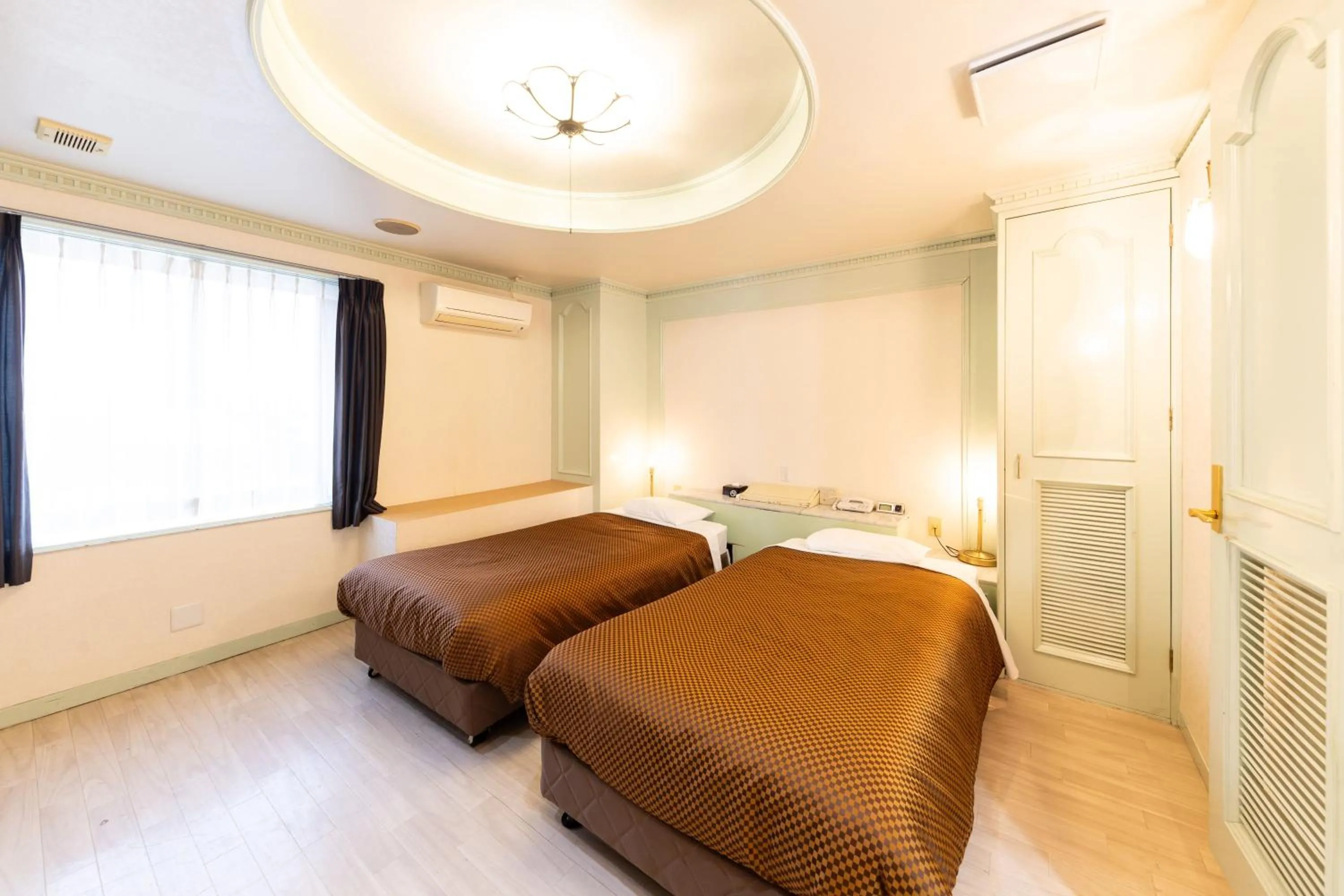 Bed in Reco Hotel Mikuni