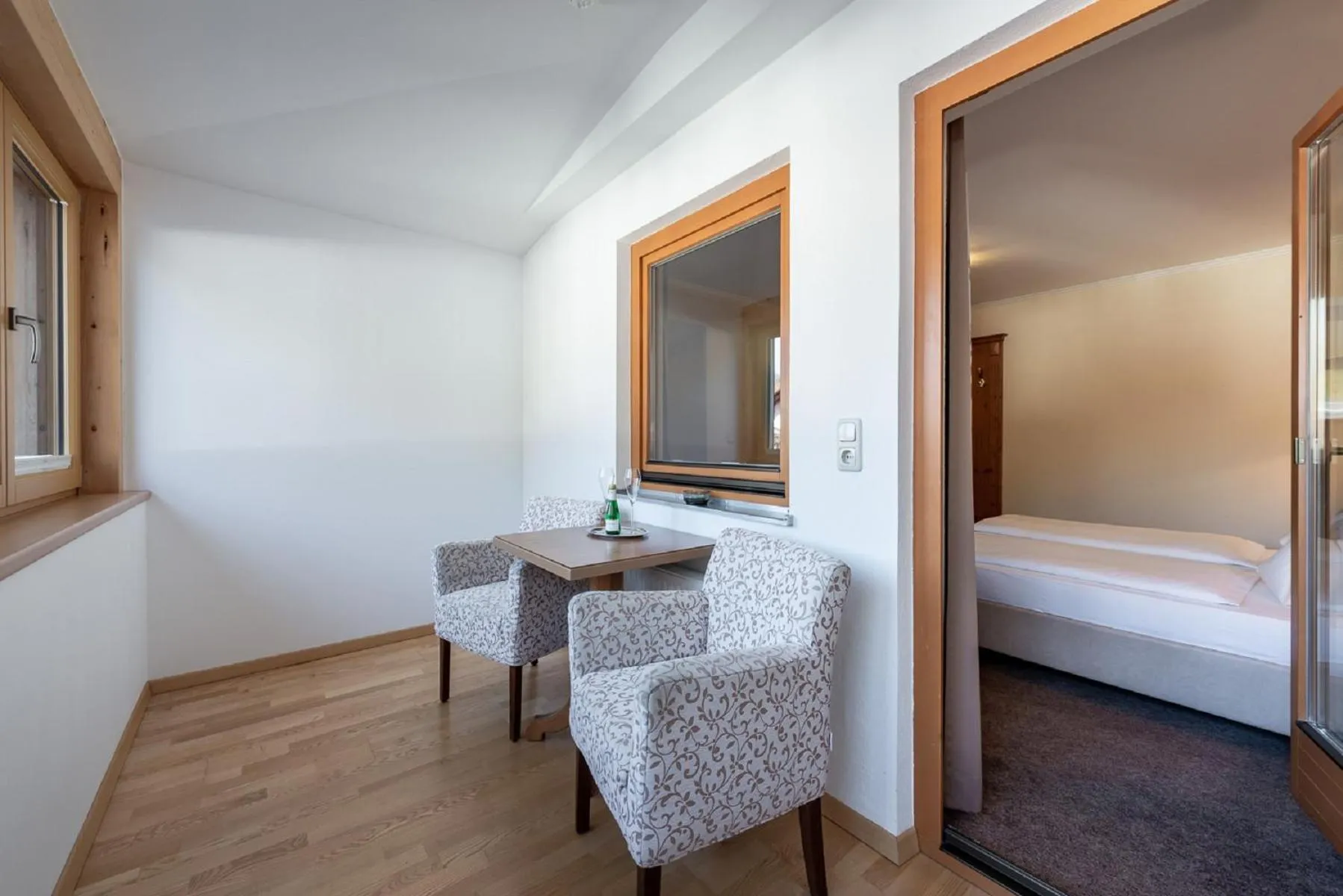 Seating area, Bed in Hotel Alpenrose