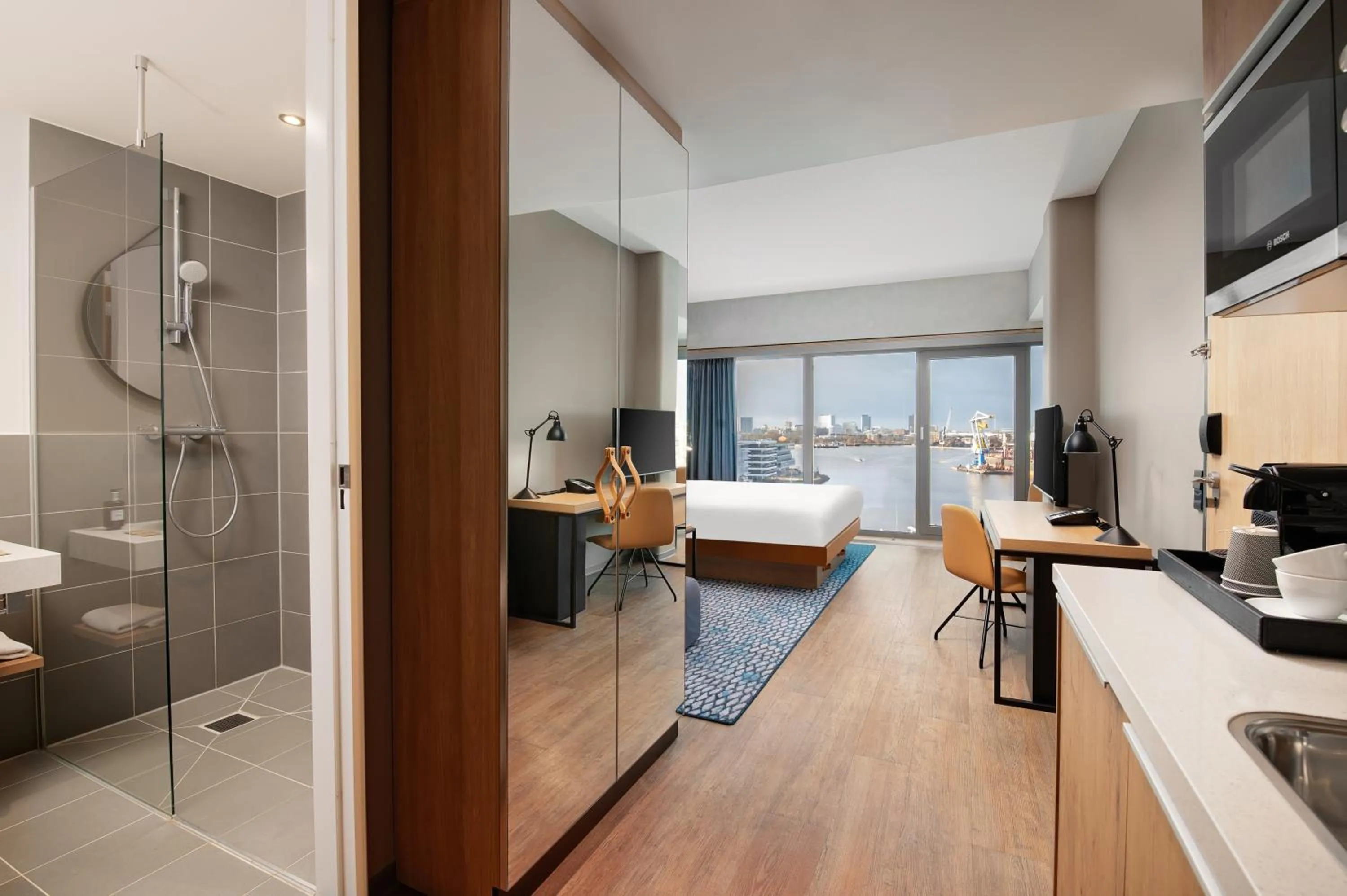 Kitchen or kitchenette, Bed in Residence Inn by Marriott Amsterdam Houthavens