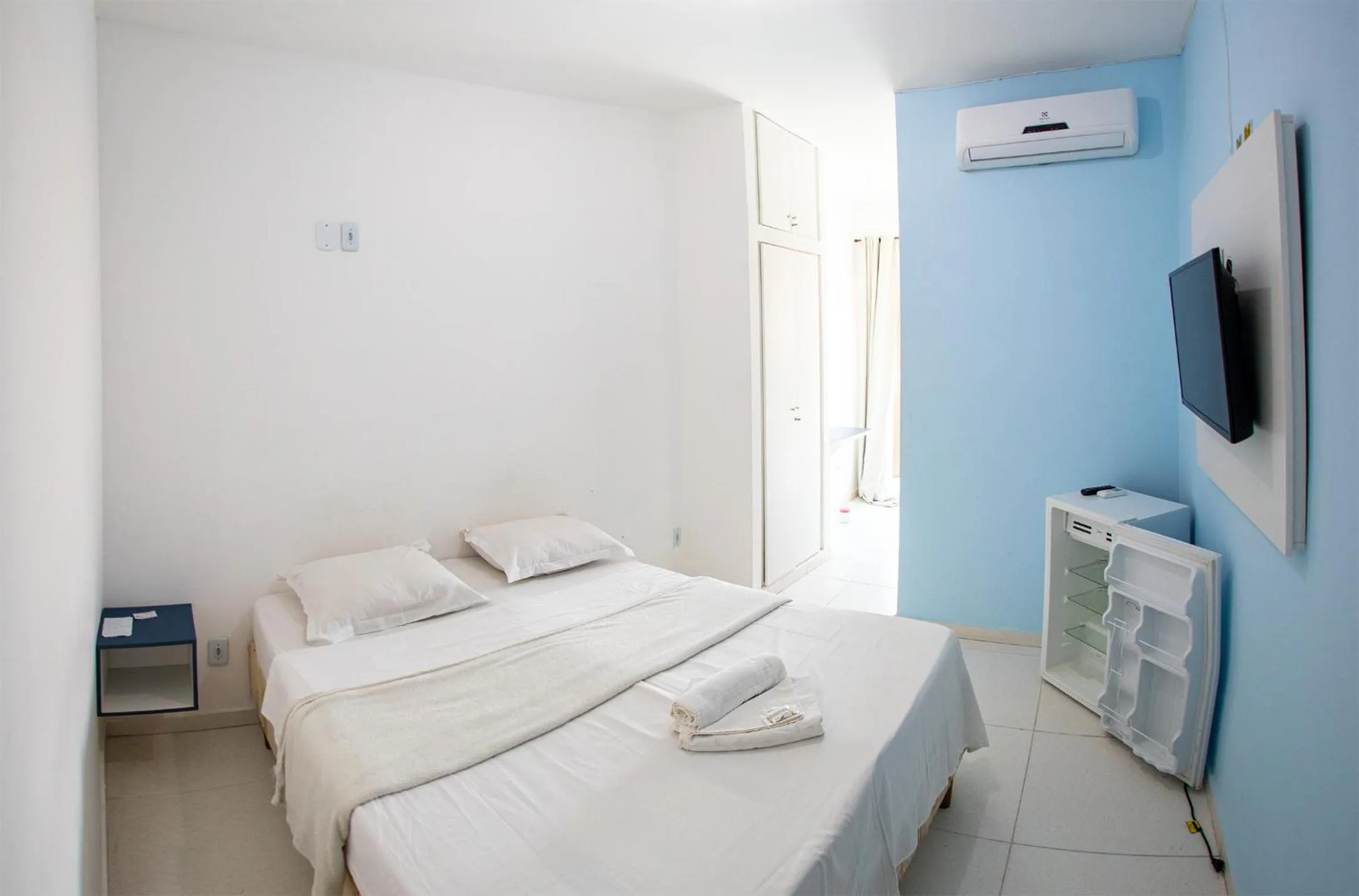 Bed in Xodó do Peró Suítes