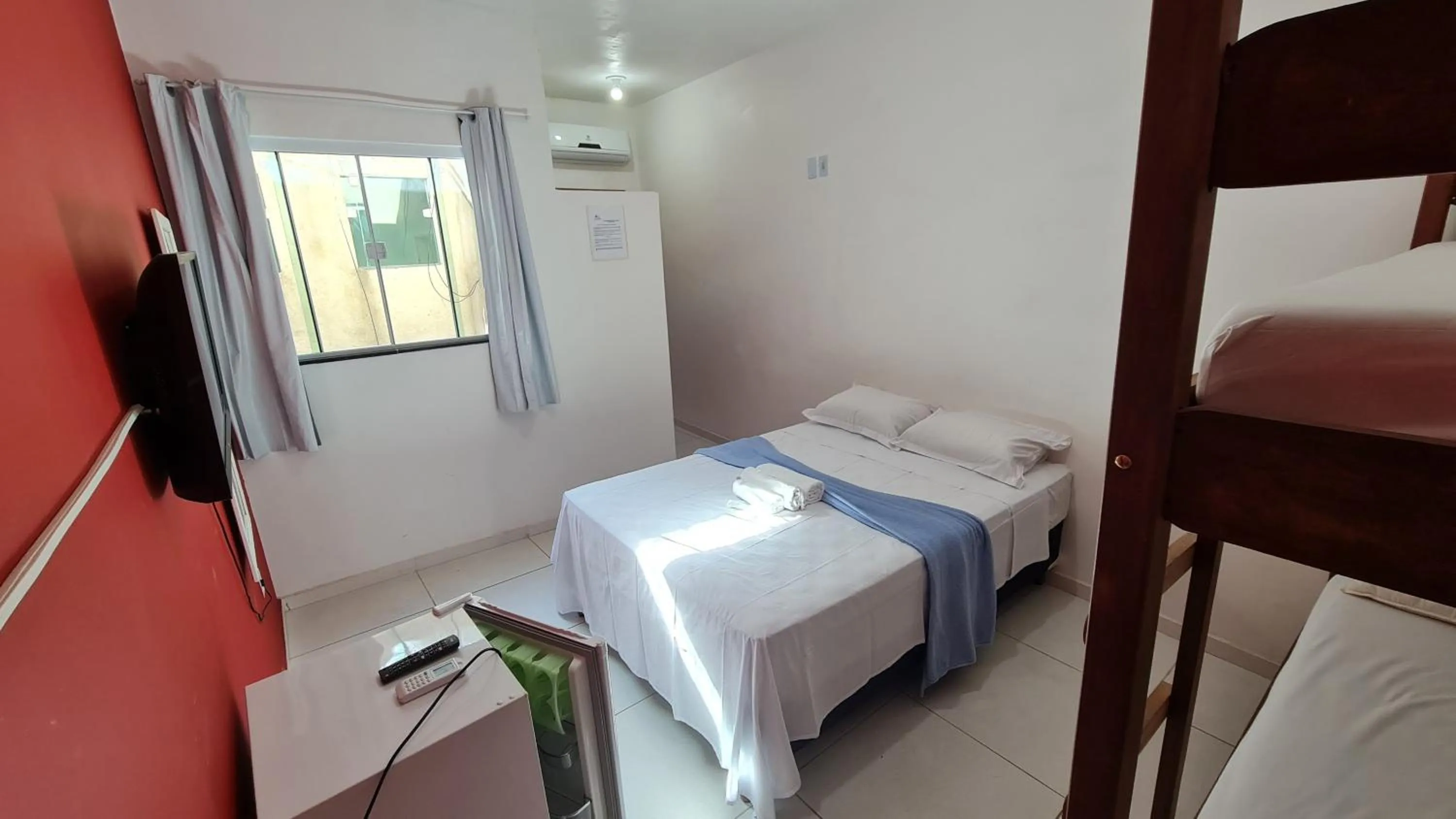 Bed in Xodó do Peró Suítes