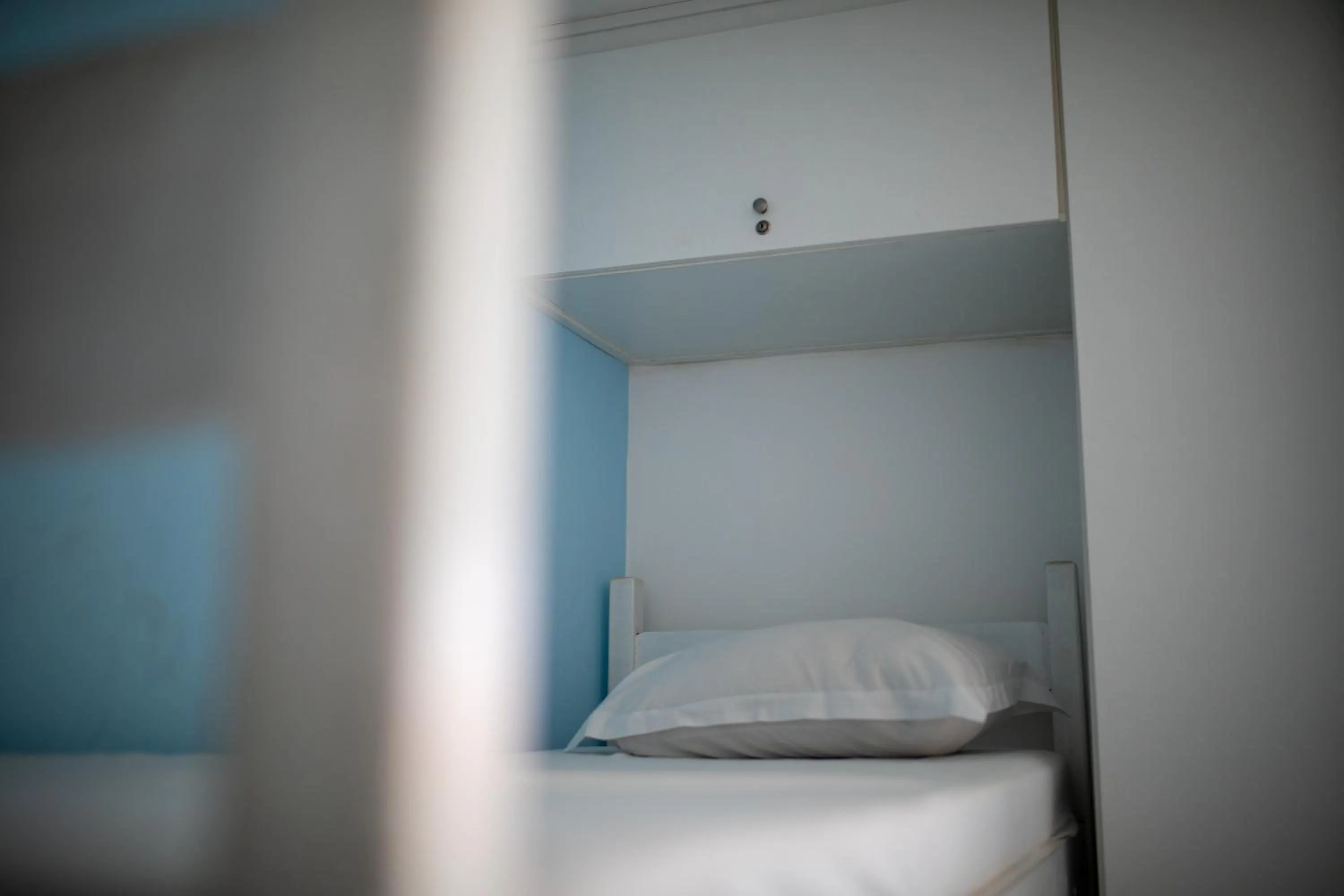 Bed in Xodó do Peró Suítes