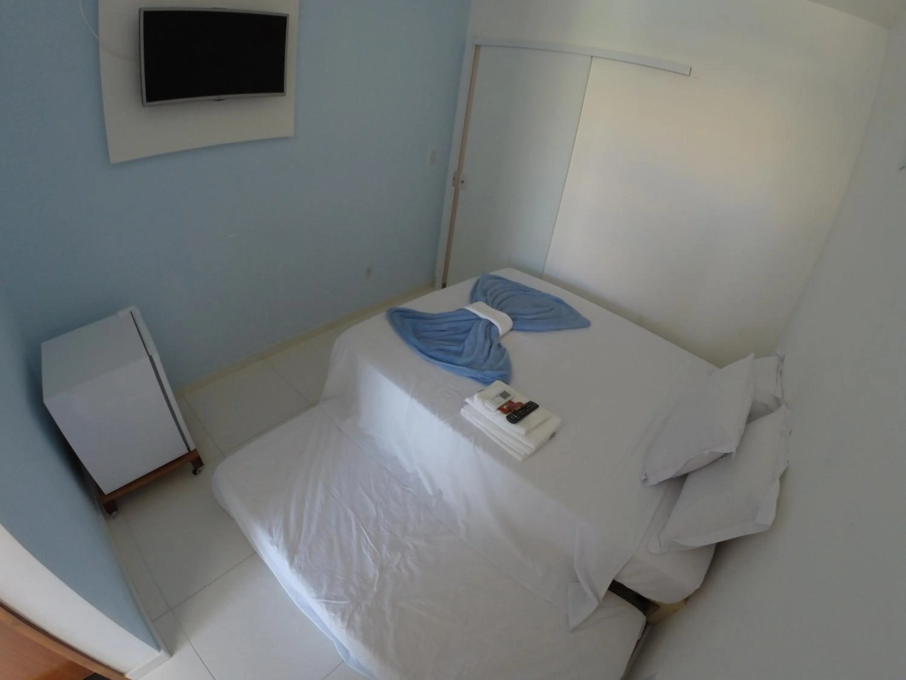 Bed in Xodó do Peró Suítes