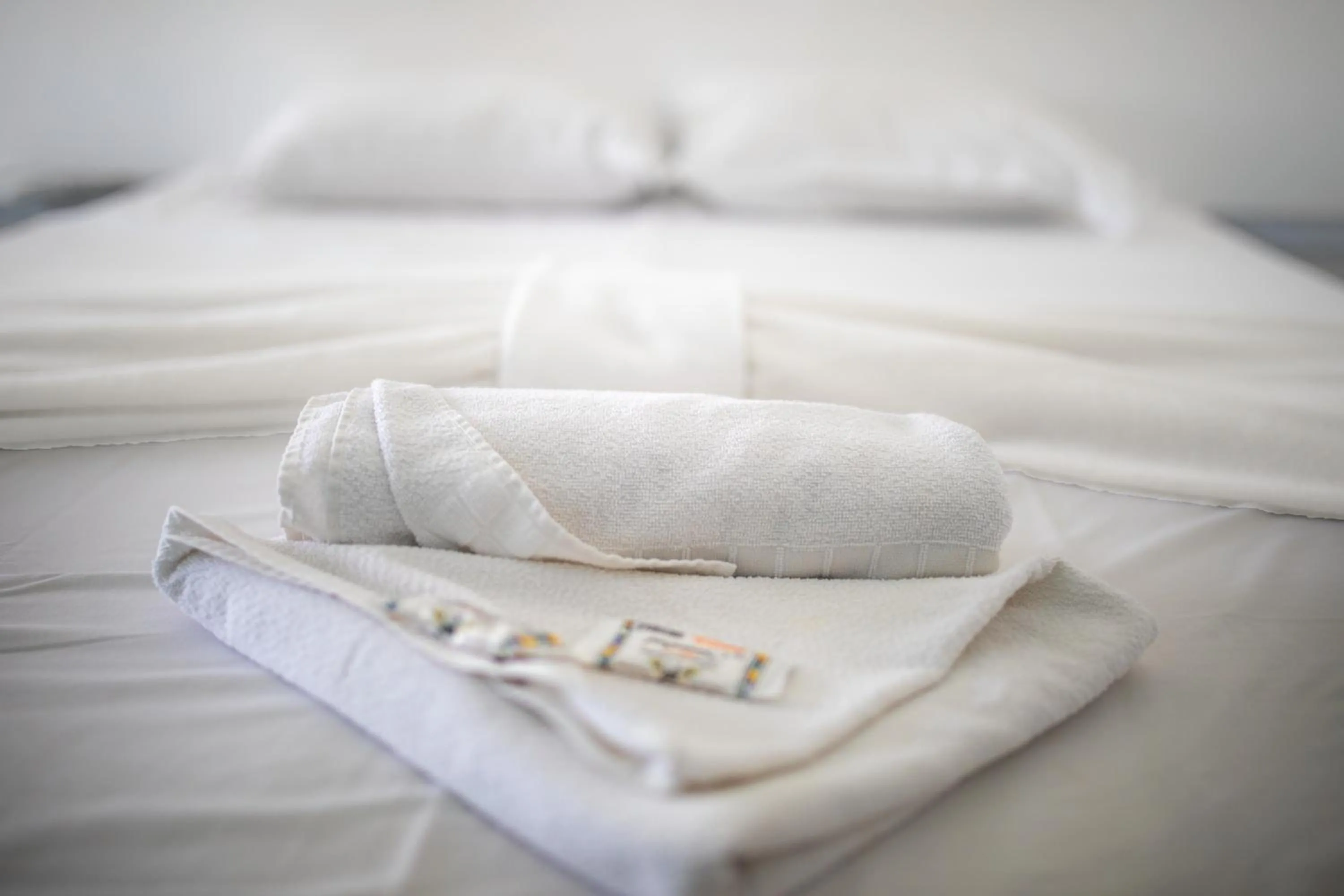 Bed in Xodó do Peró Suítes