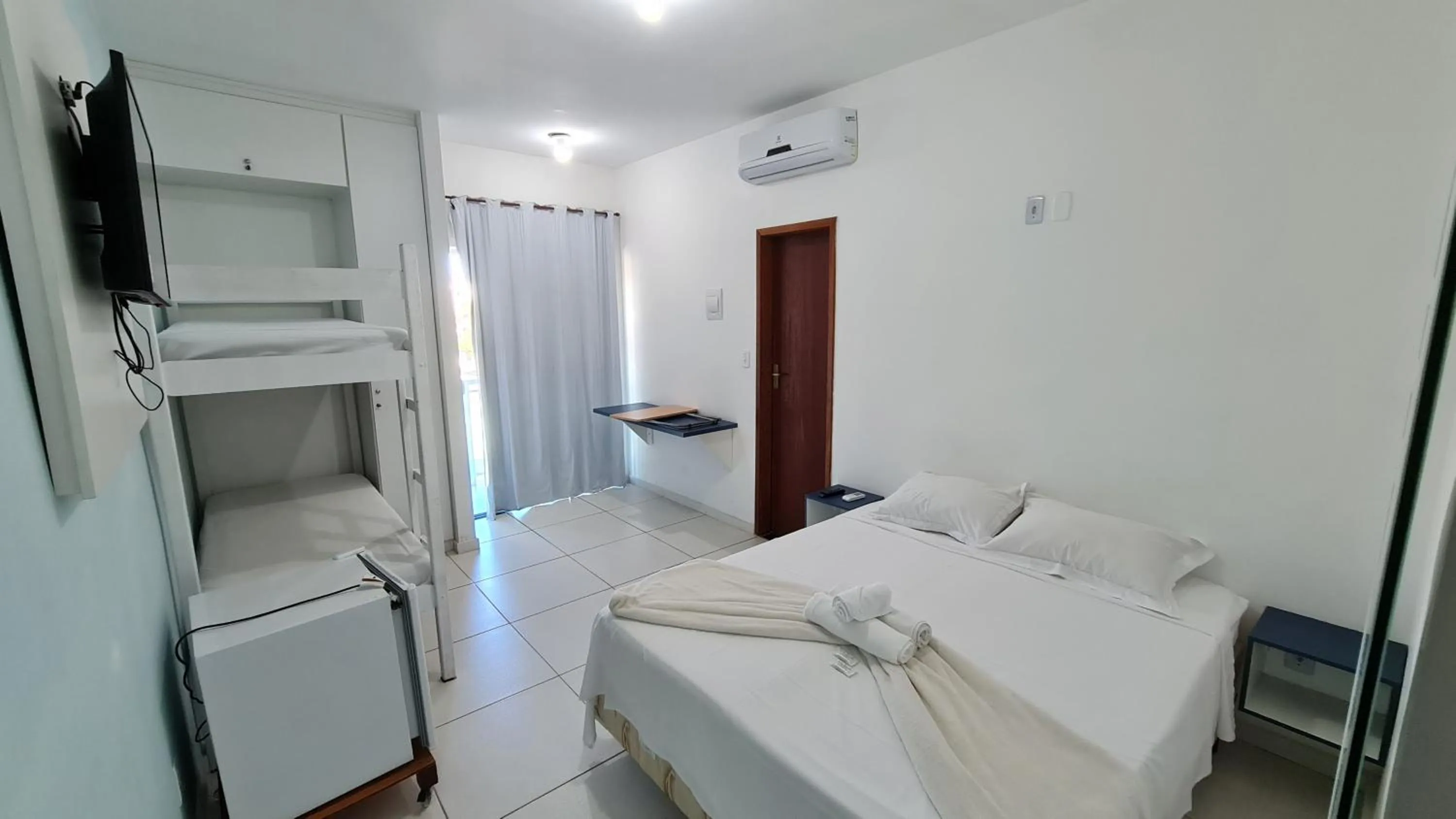 Bed in Xodó do Peró Suítes