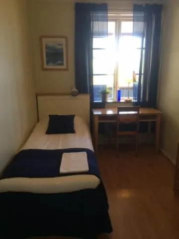 Bed in Hotell Paradis