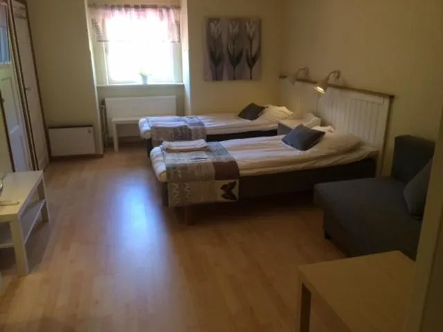 Bed in Hotell Paradis