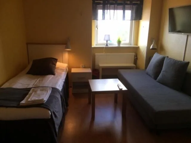 Bed in Hotell Paradis