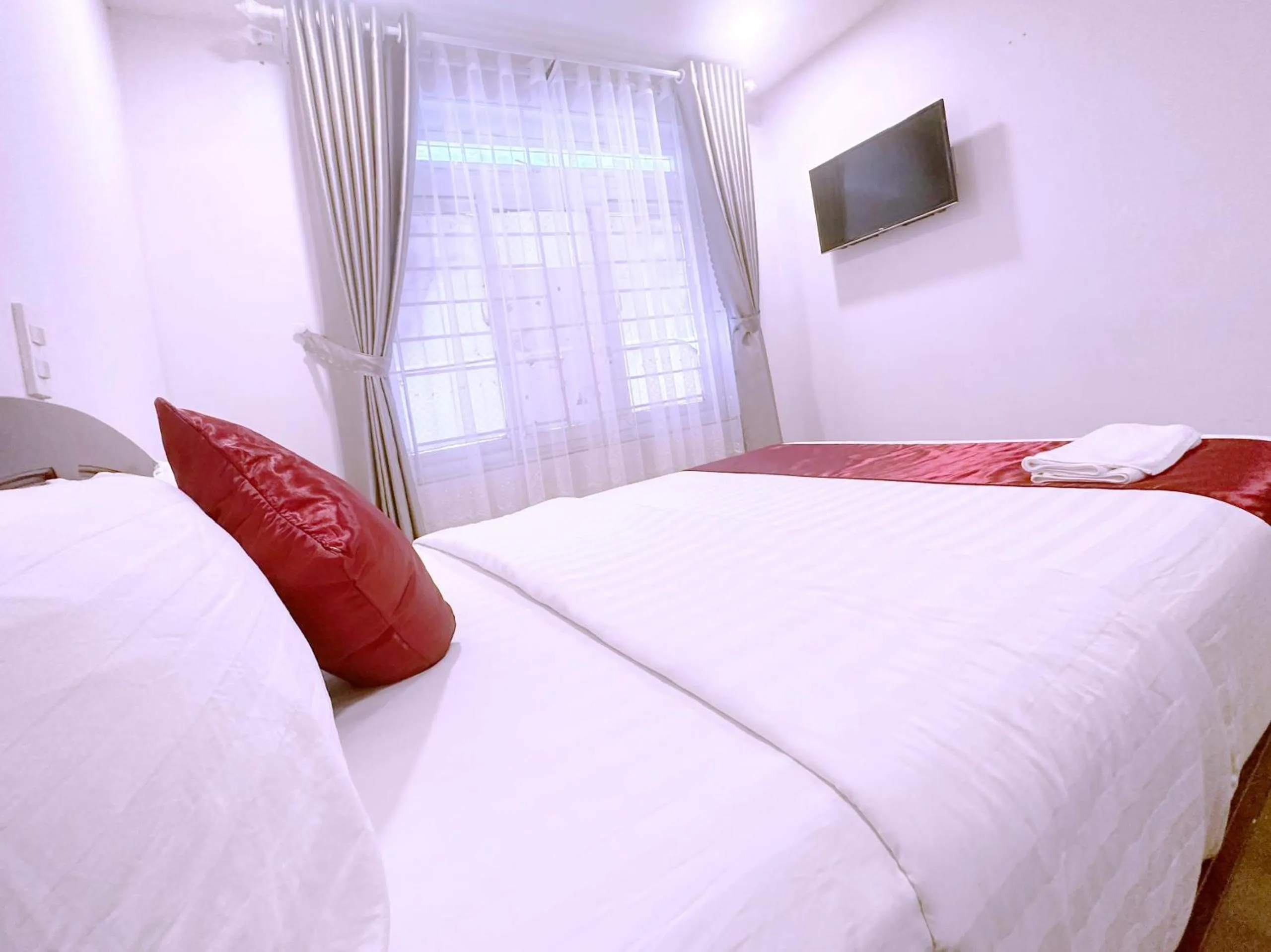 Bed in White Horse Dalat Hotel