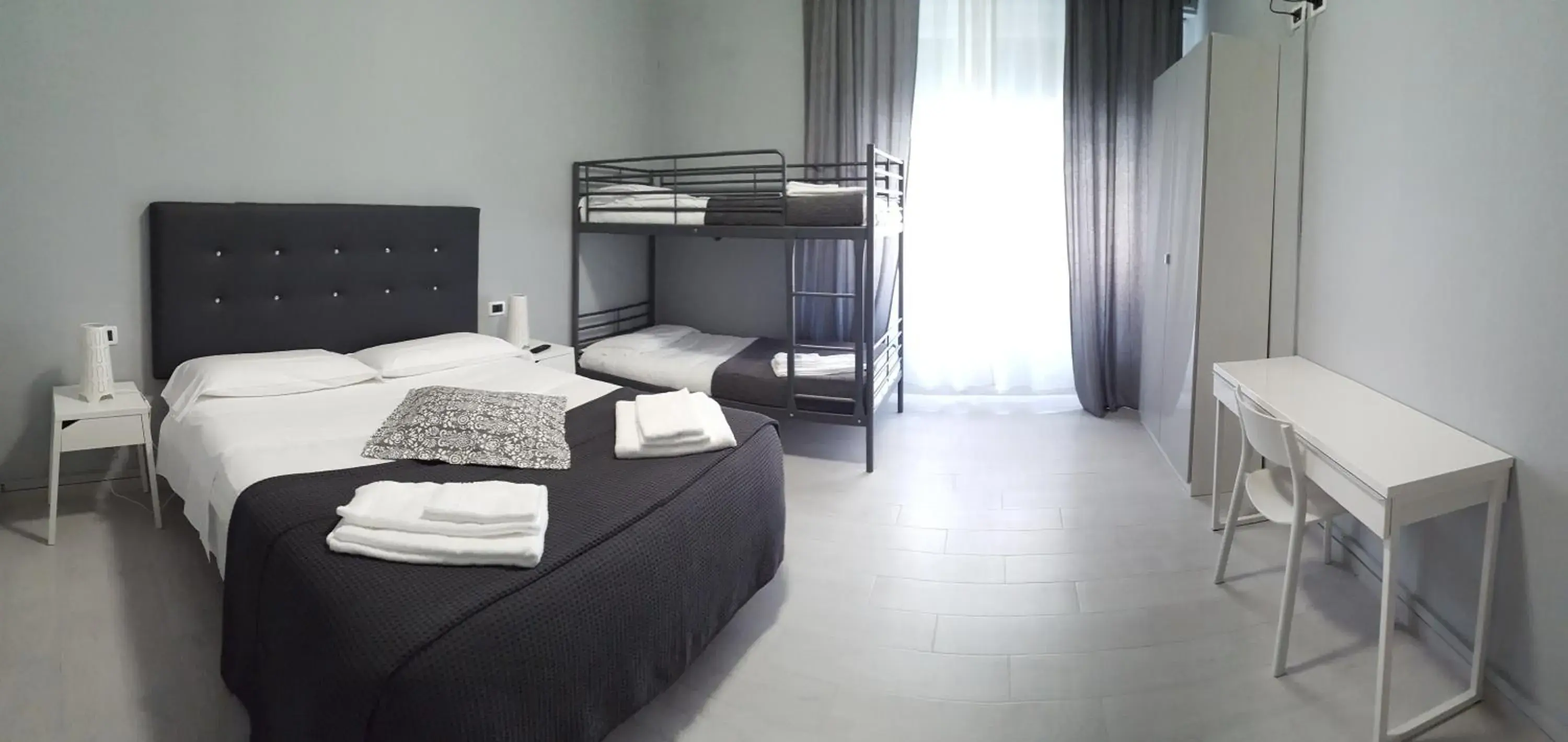 Quadruple Room in Hotel Milano Quadruple Room in Hotel Milano