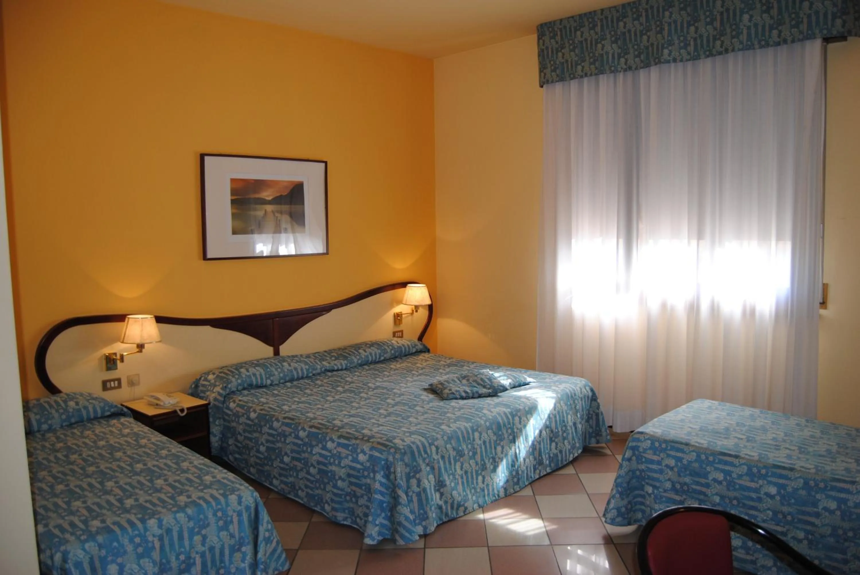 Bed in Hotel La Fenice