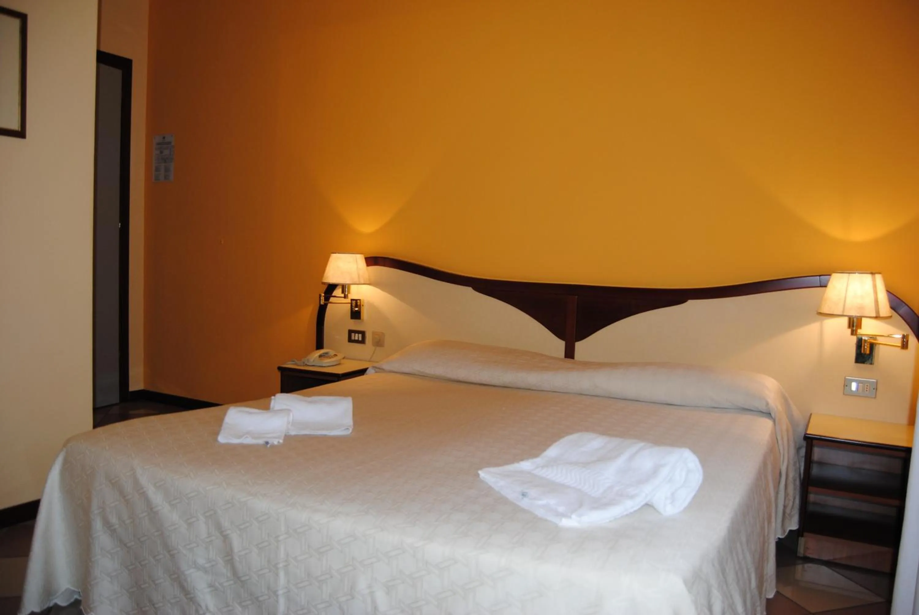 Bed in Hotel La Fenice