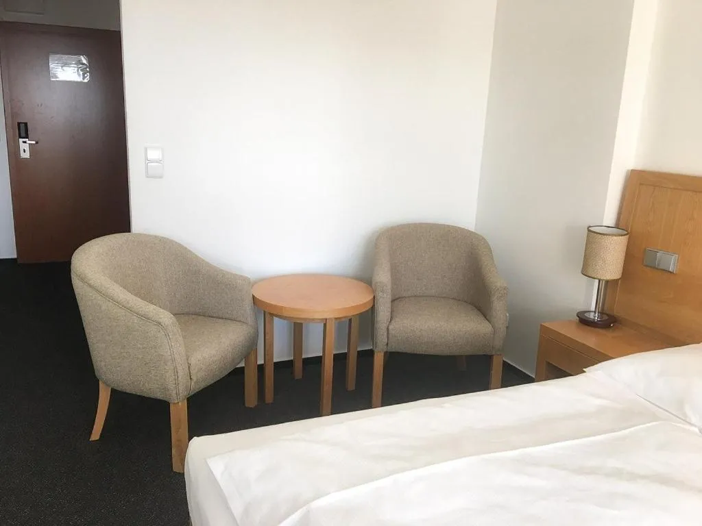 Bedroom, Bed in LIPNO WELLNESS - FRYMBURK HOTEL private family room