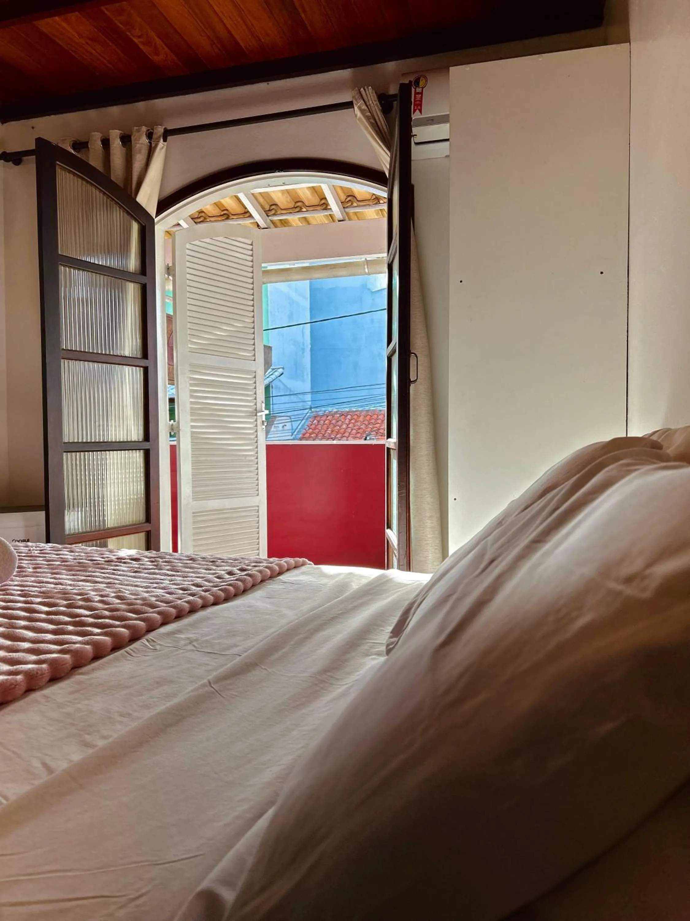 Bed in Bougainville Suítes