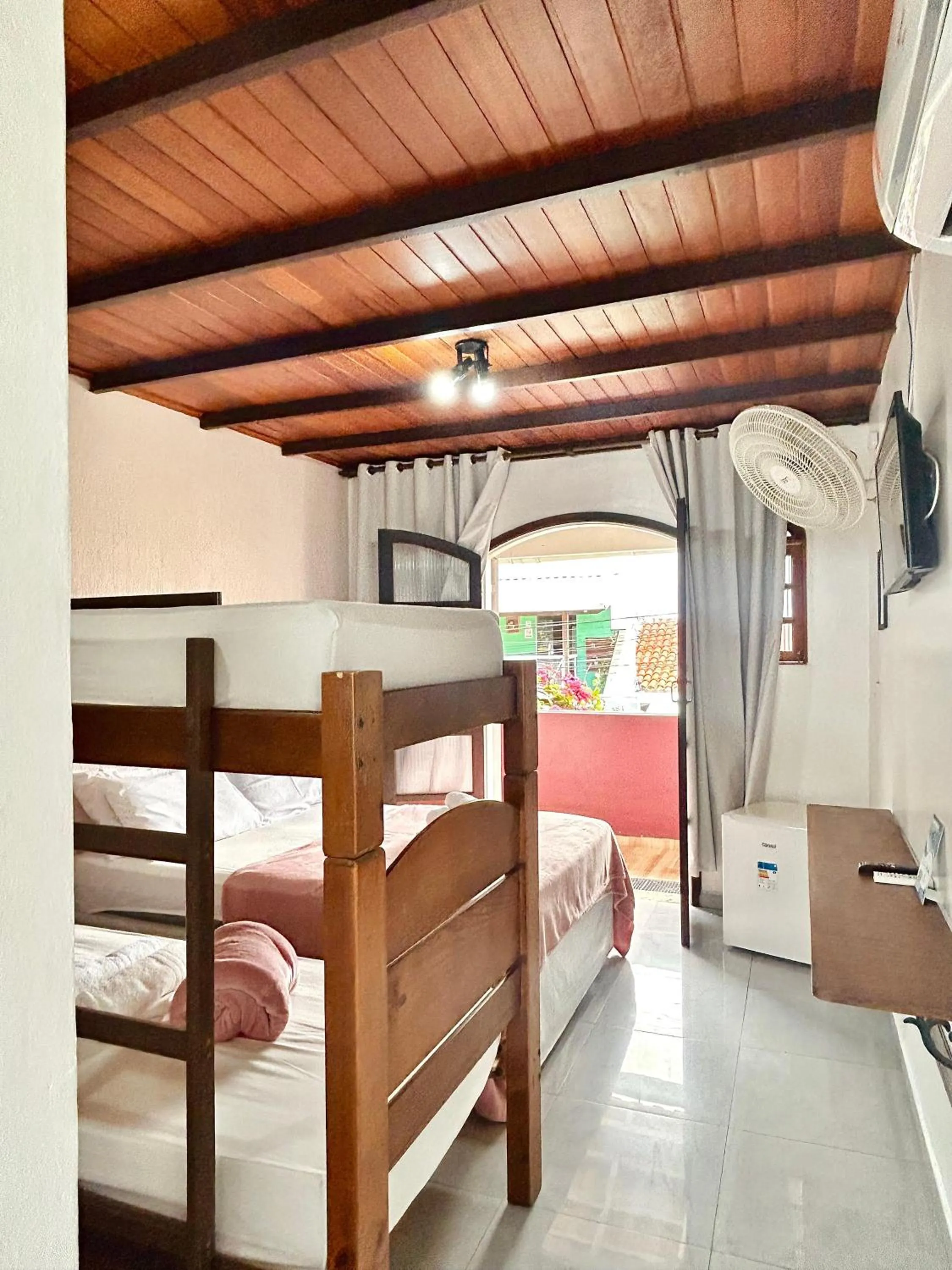 Bed in Bougainville Suítes