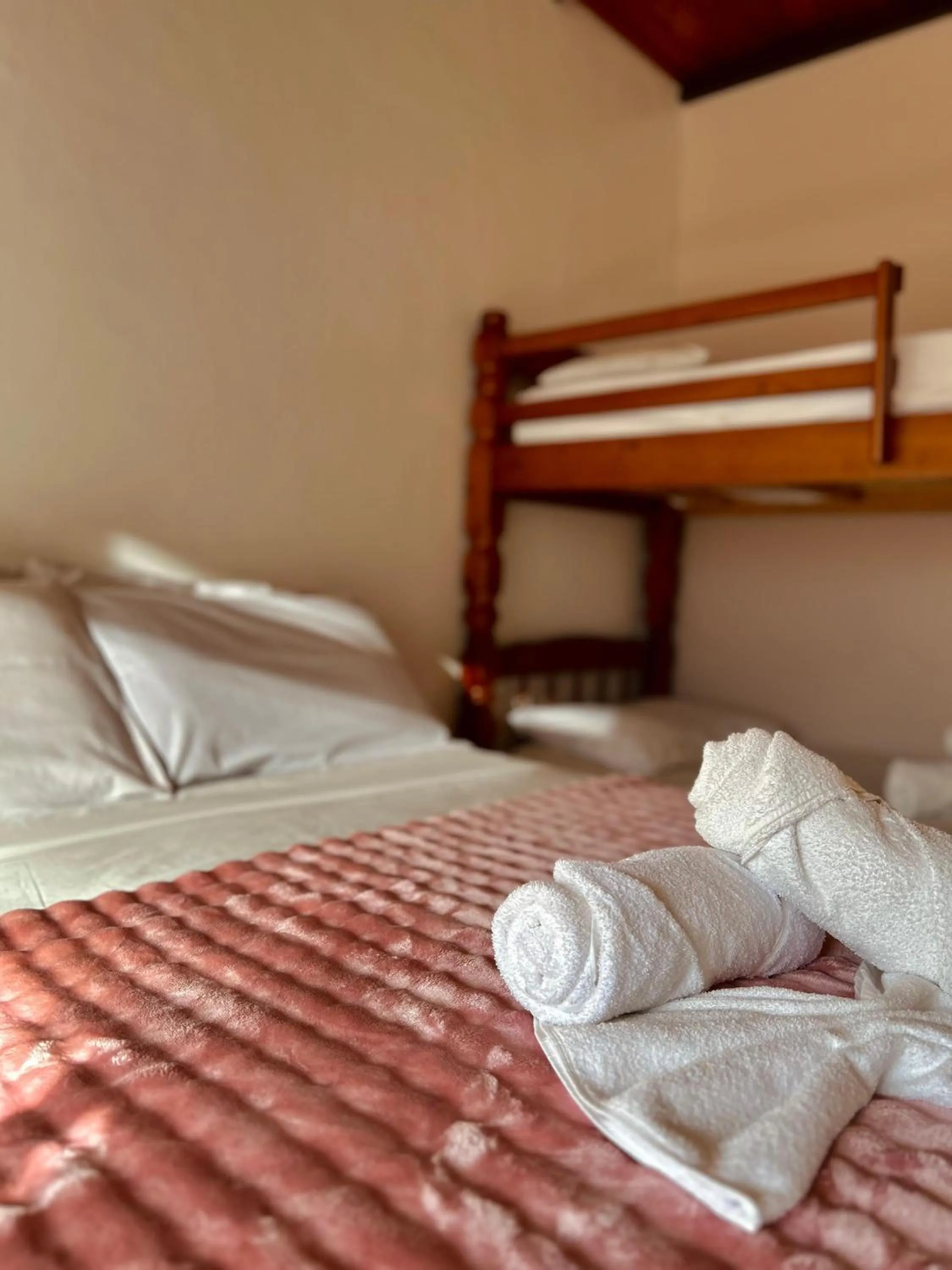 Bed in Bougainville Suítes