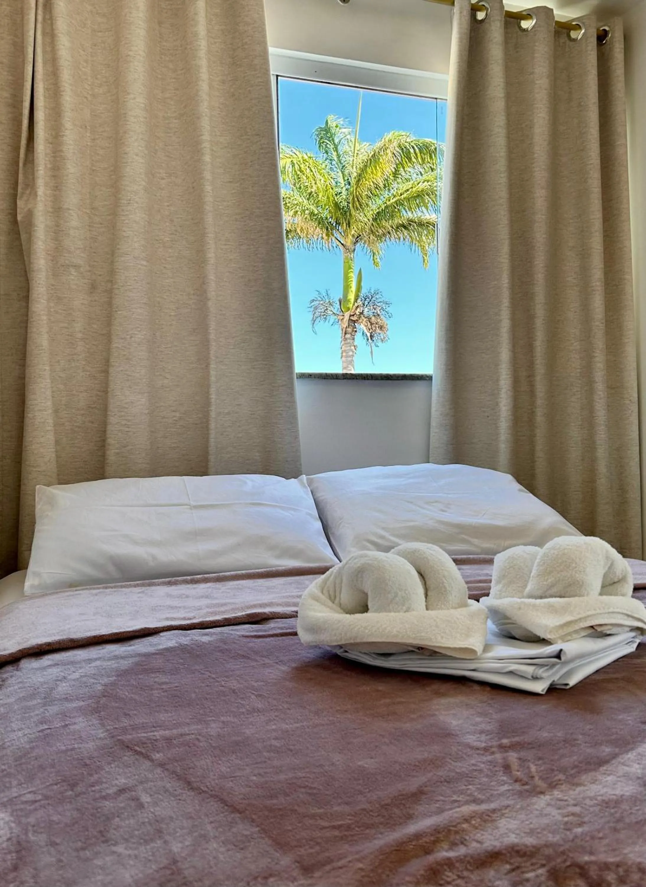 Bed in Bougainville Suítes