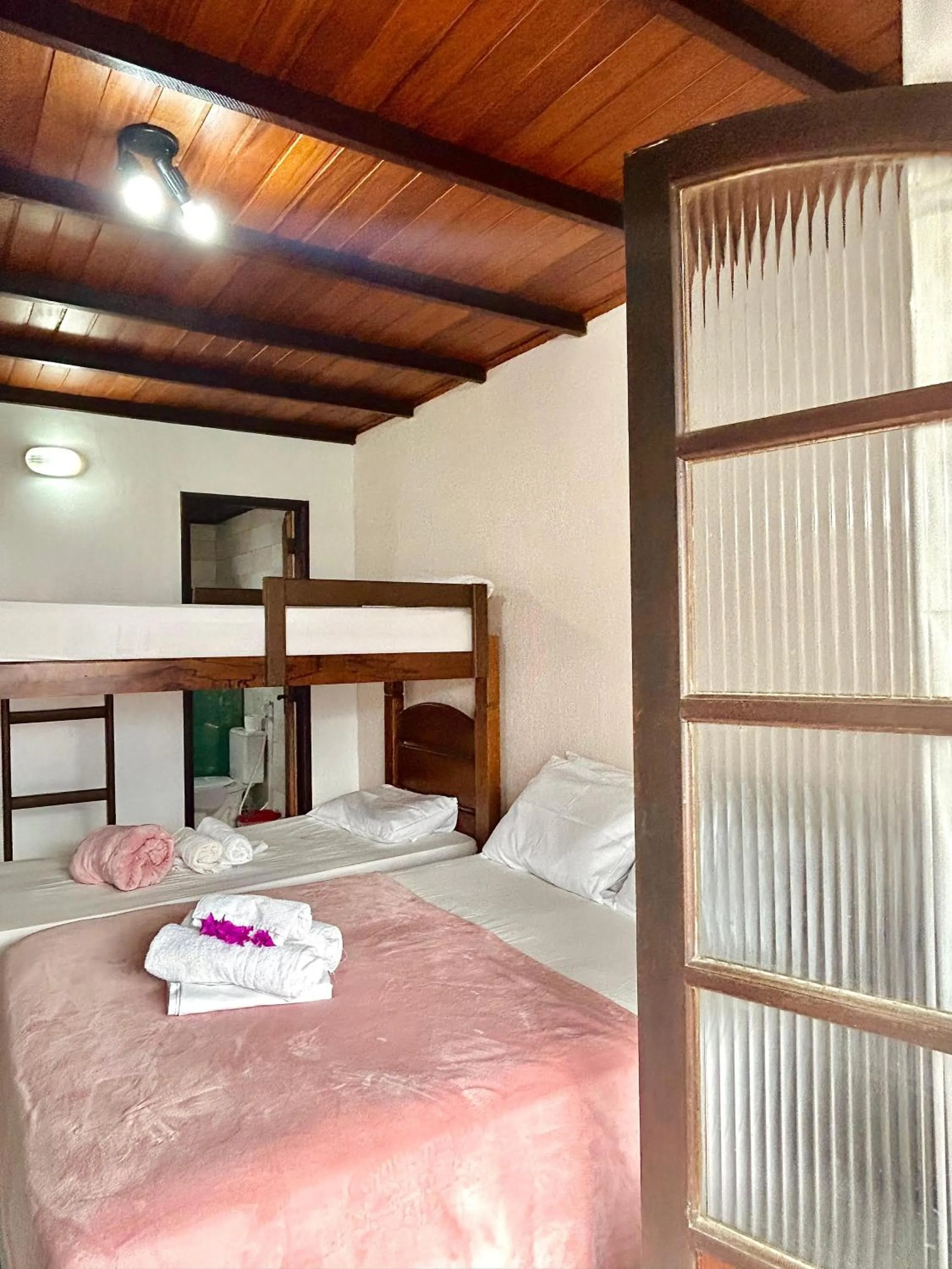 Bed in Bougainville Suítes