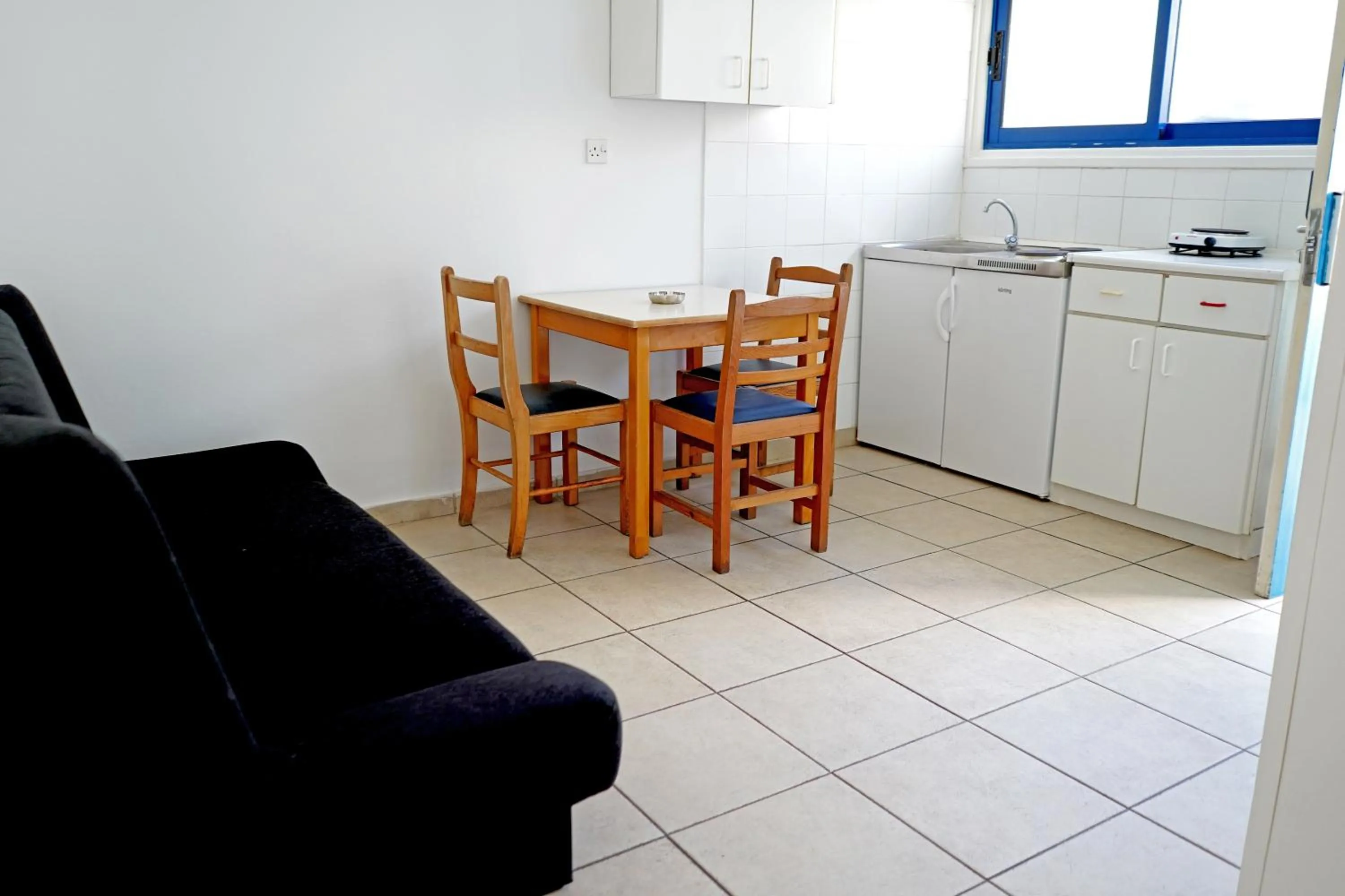 Kitchen or kitchenette in Green Bungalows Hotel Apartments - Residents Only