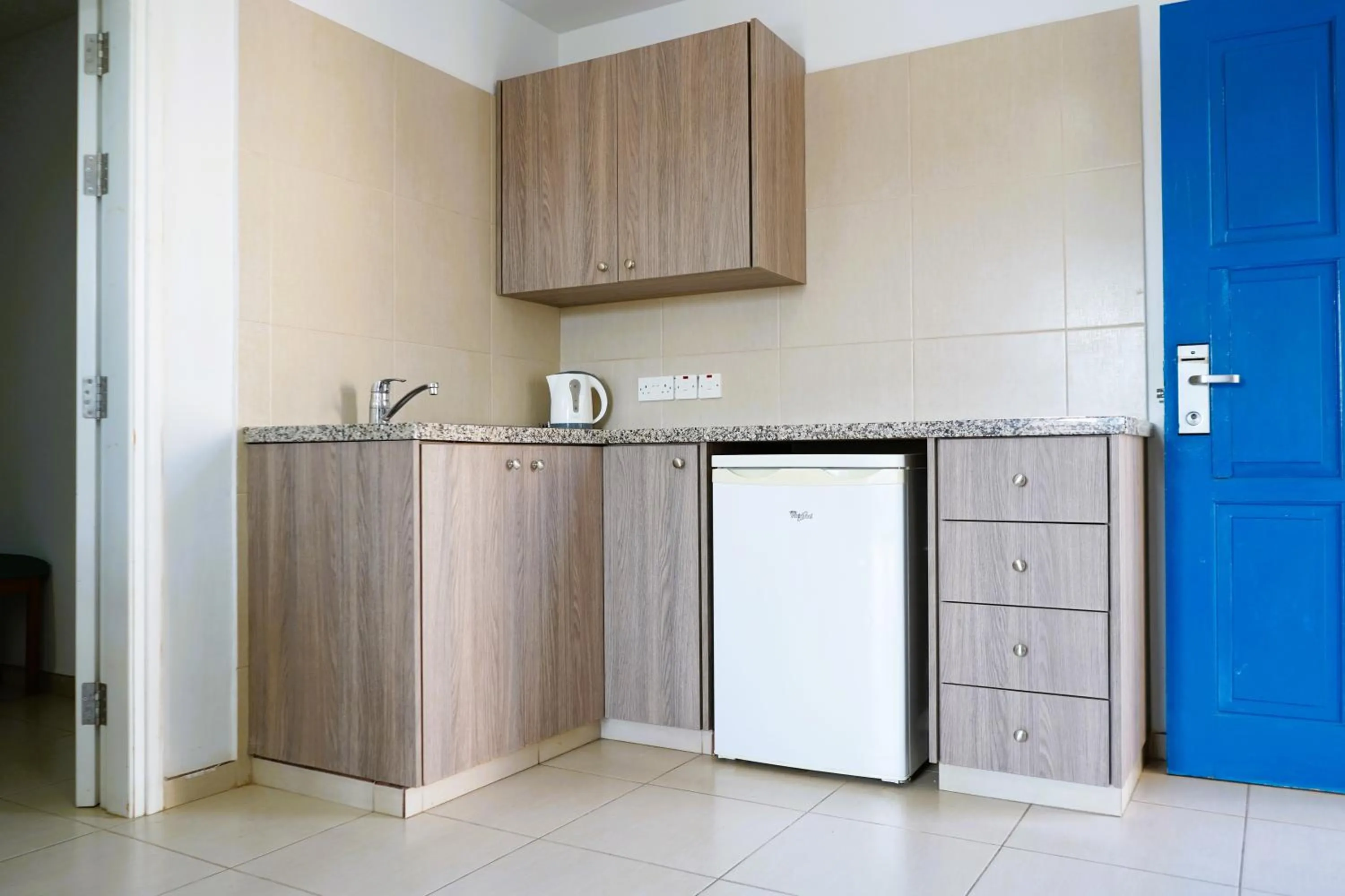 Kitchen or kitchenette in Green Bungalows Hotel Apartments - Residents Only