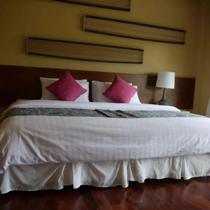 Bed in GRANMONTE Wine Cottage