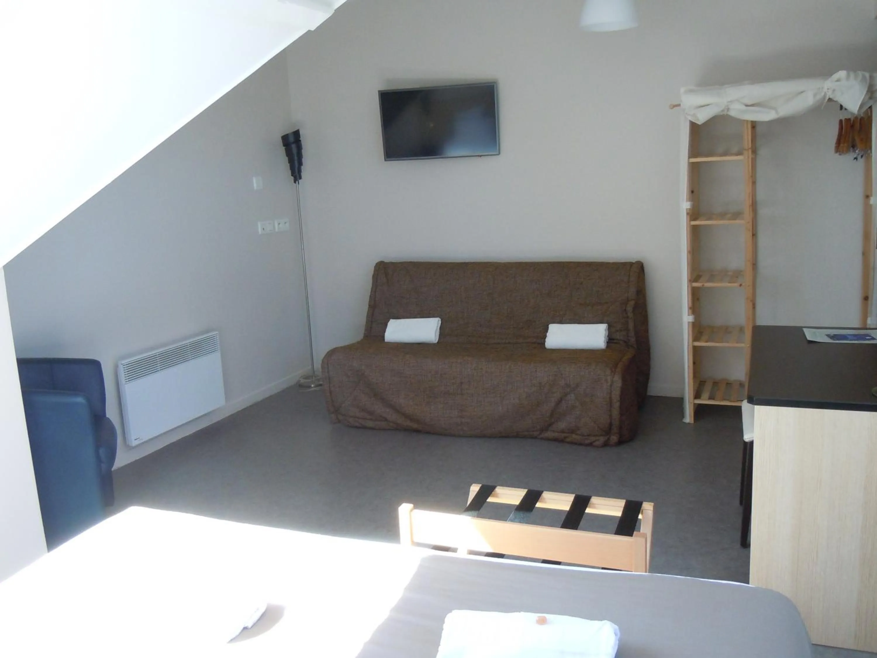 Bed in Sweet Home Appart'Hôtel Deauville Sud