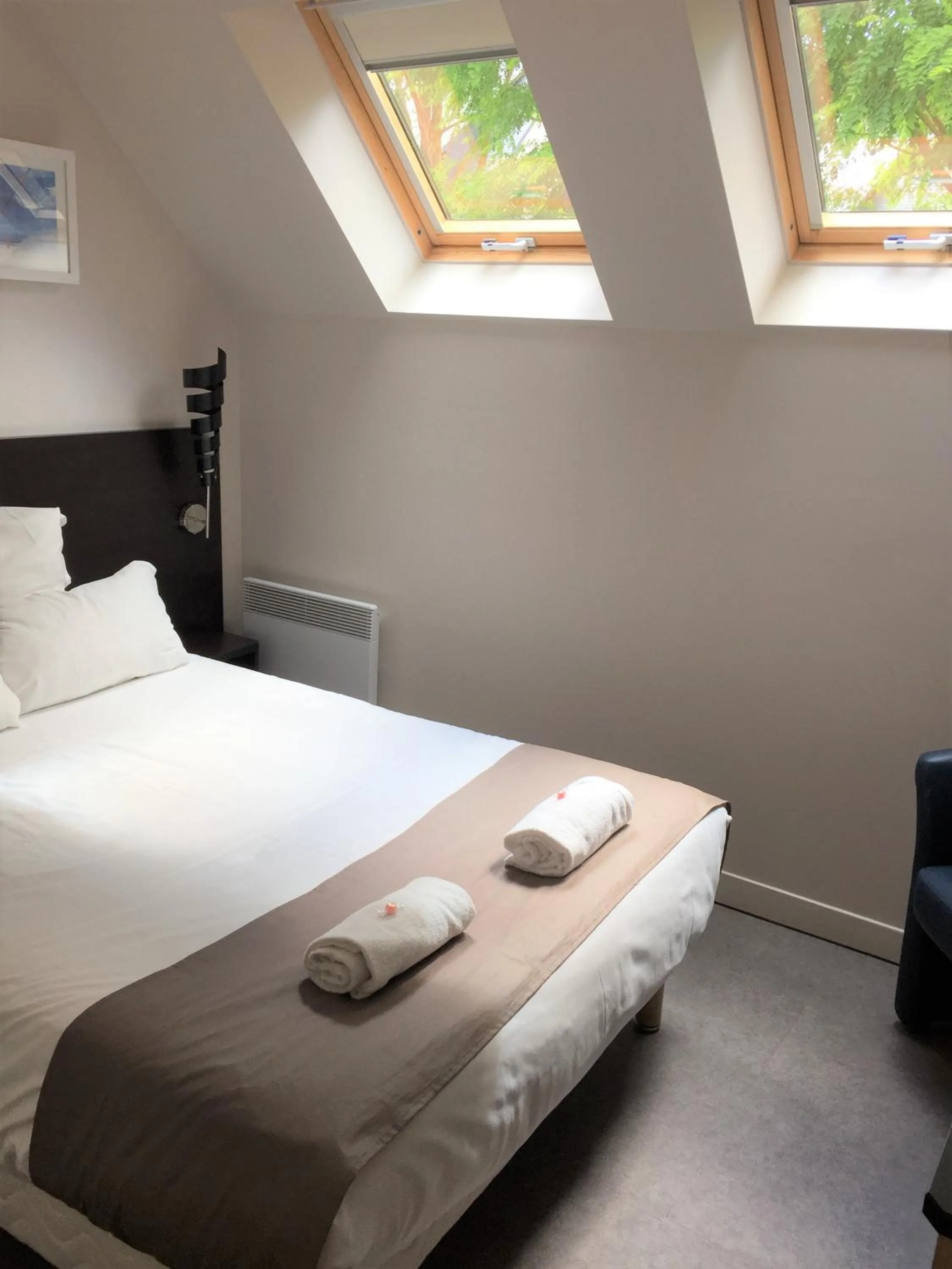 Bed in Sweet Home Appart'Hôtel Deauville Sud