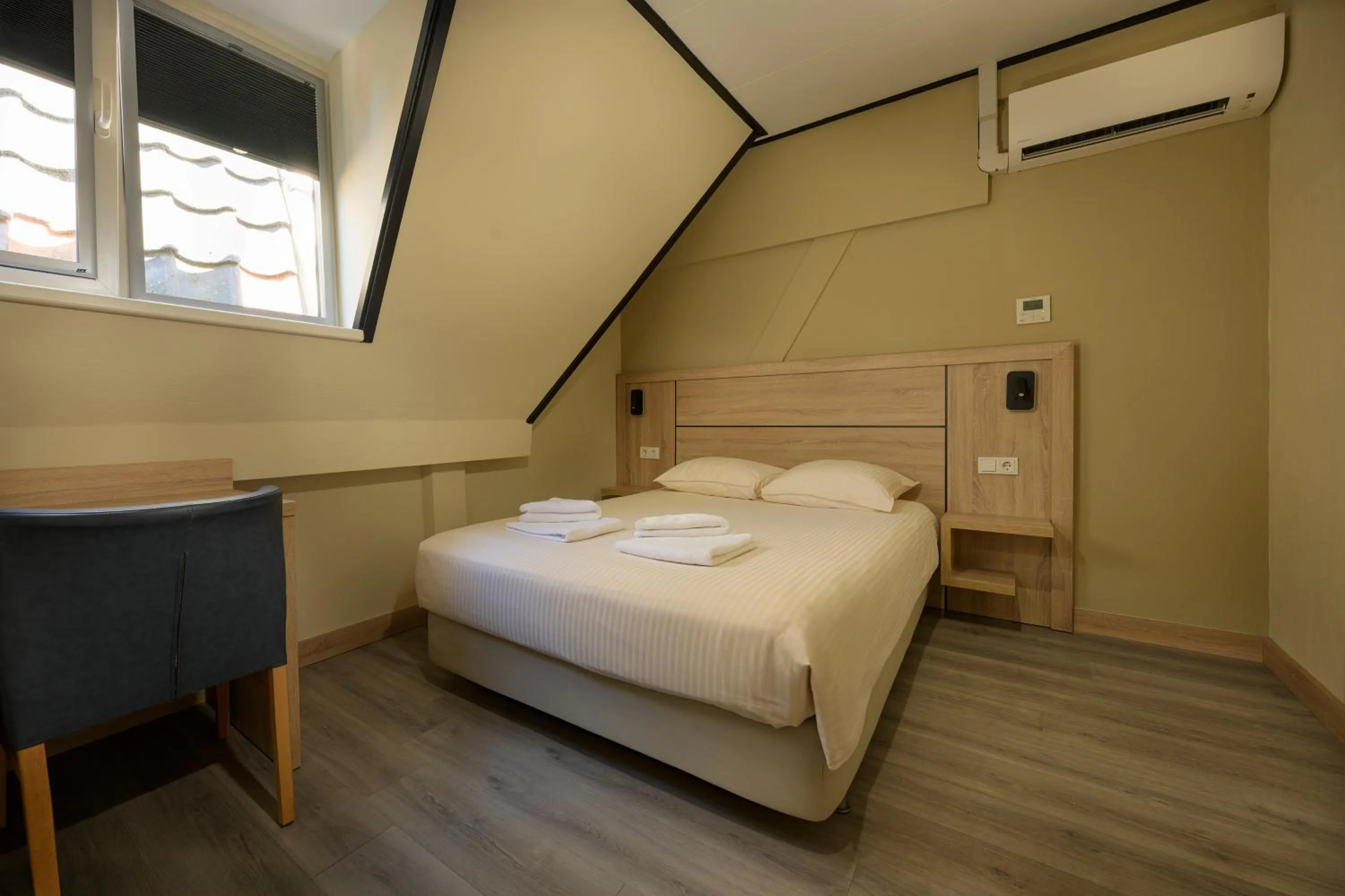 Bed in Atlas Village Brielle