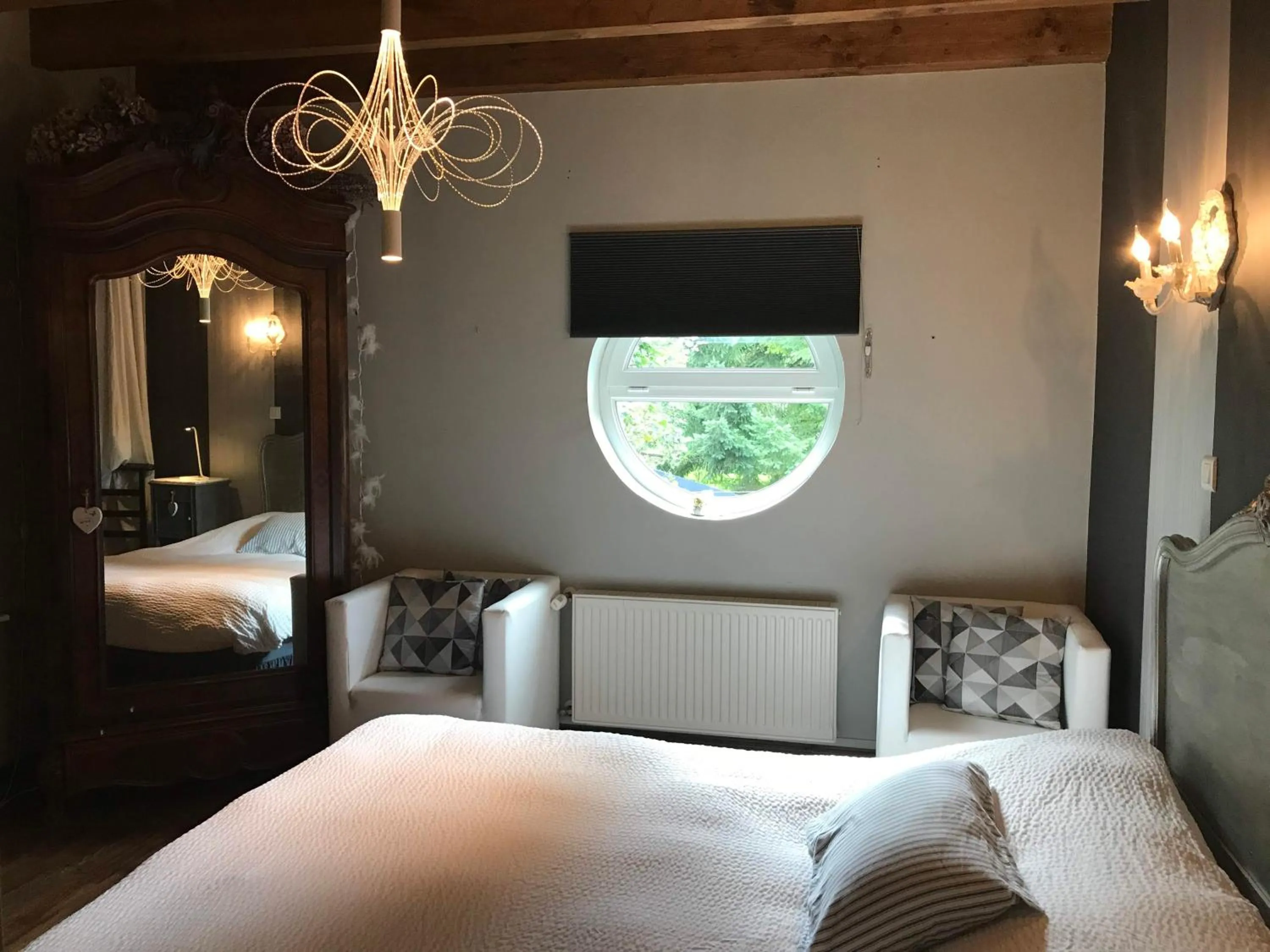 Bedroom in Logis Hôtel DOMAINE du MOULIN