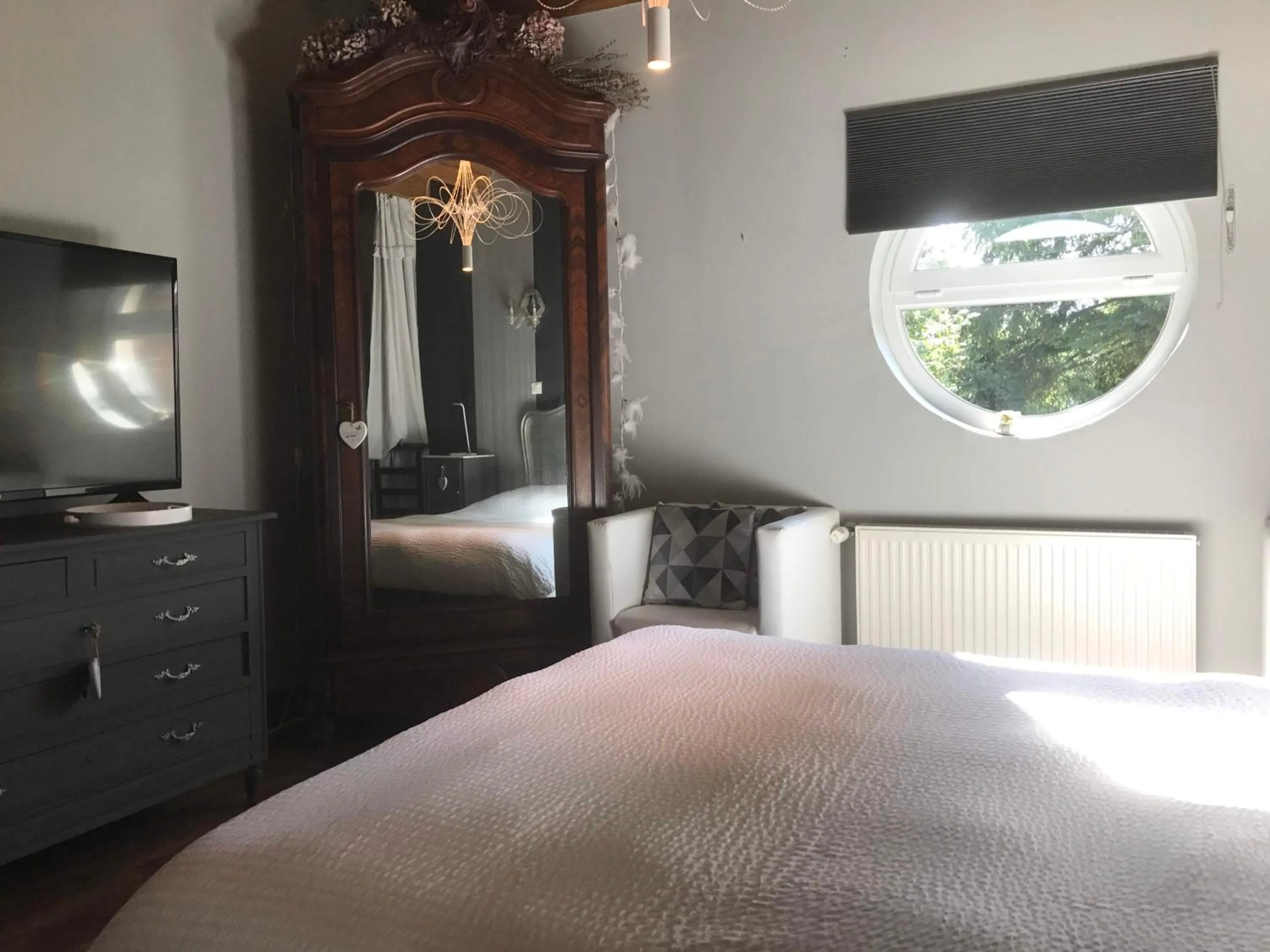 Bedroom in Logis Hôtel DOMAINE du MOULIN