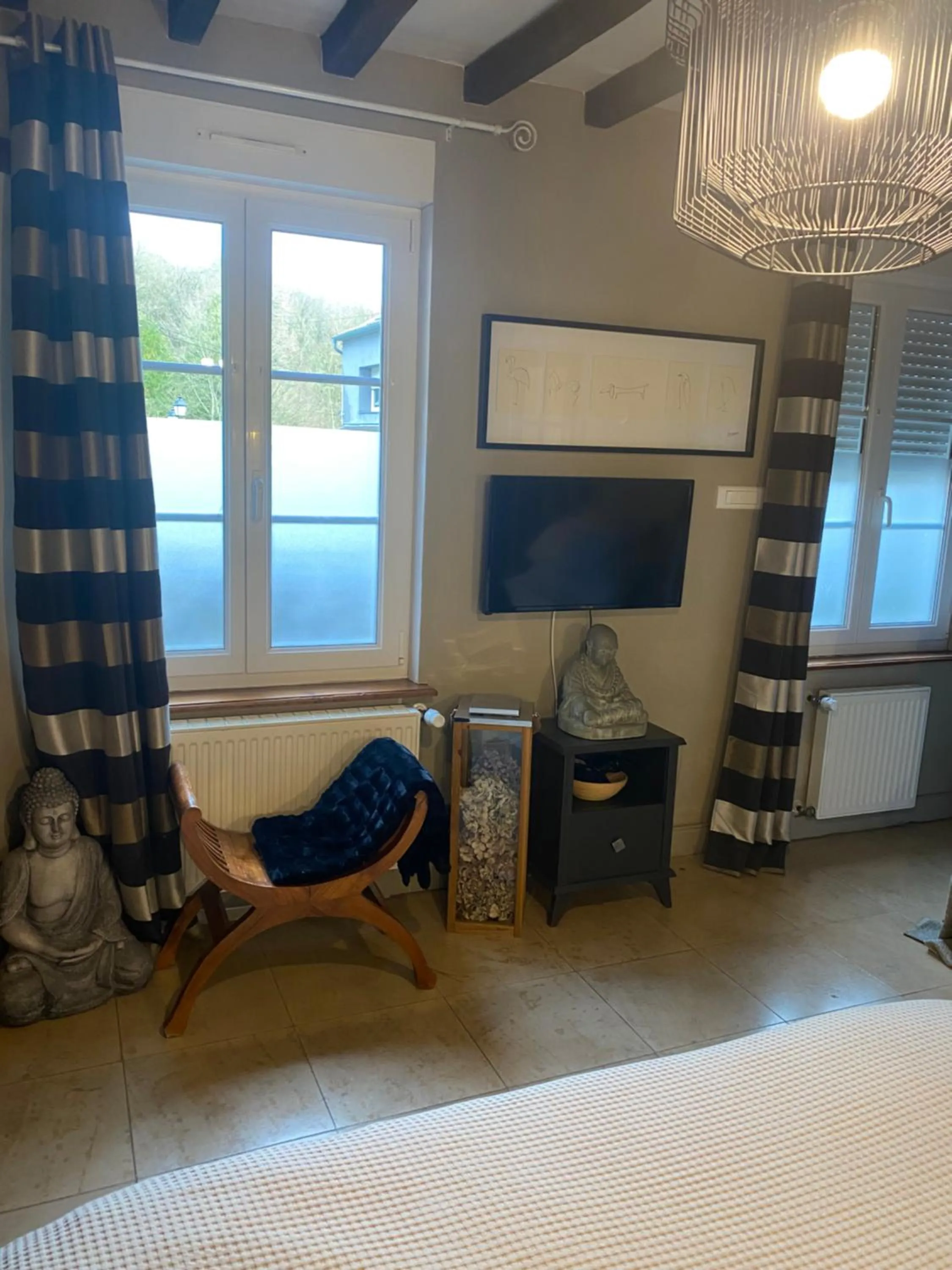 Bedroom in Logis Hôtel DOMAINE du MOULIN