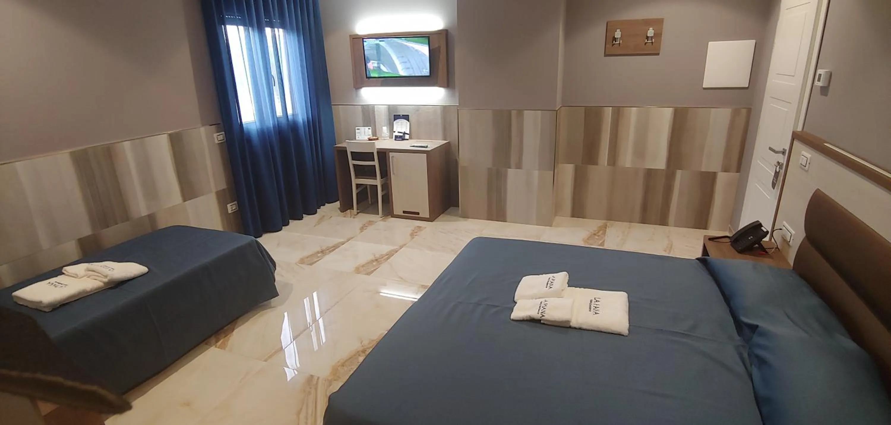 Photo of the whole room, Bed in La Piana Hotel