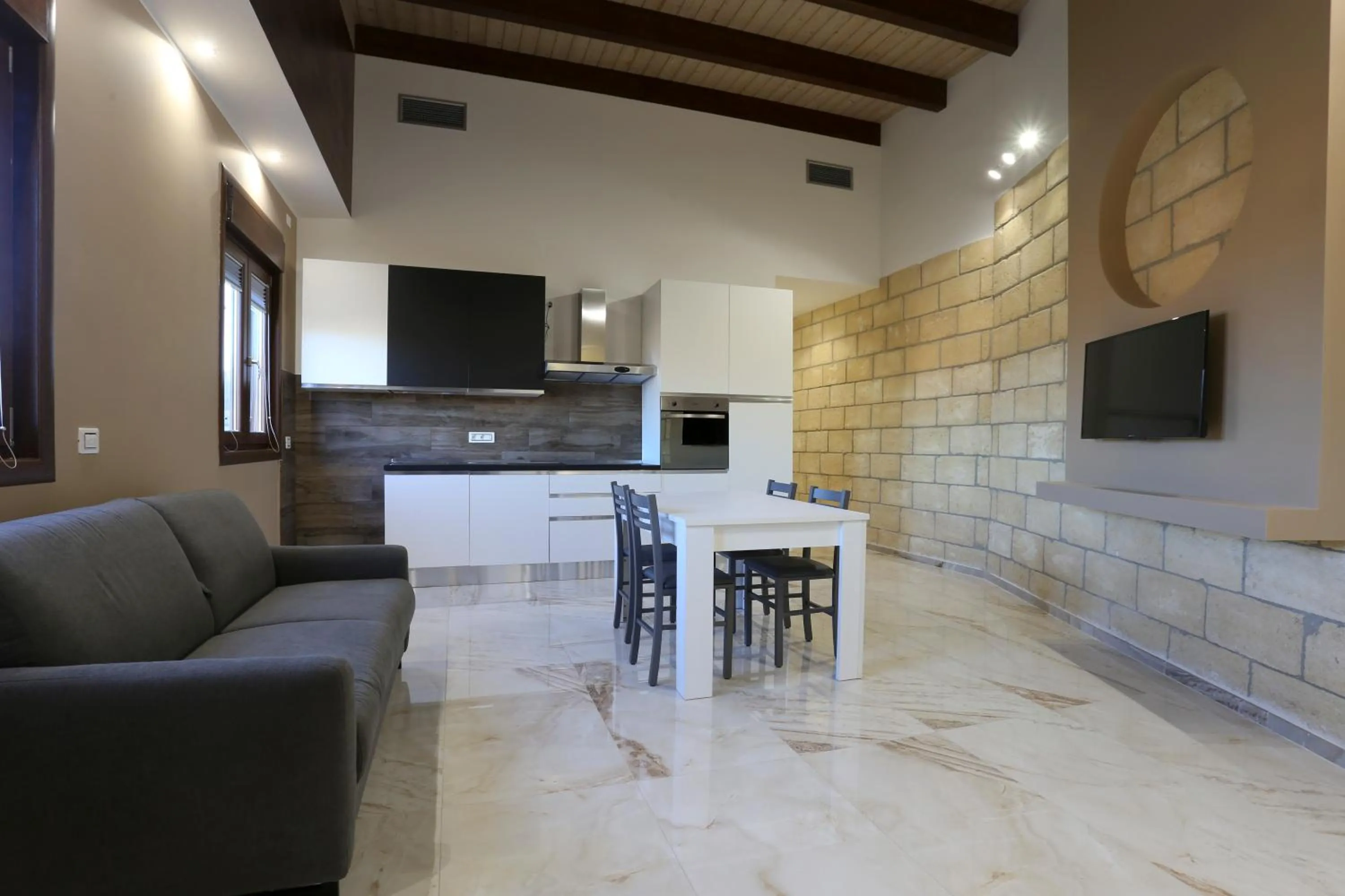 Kitchen or kitchenette in La Piana Hotel