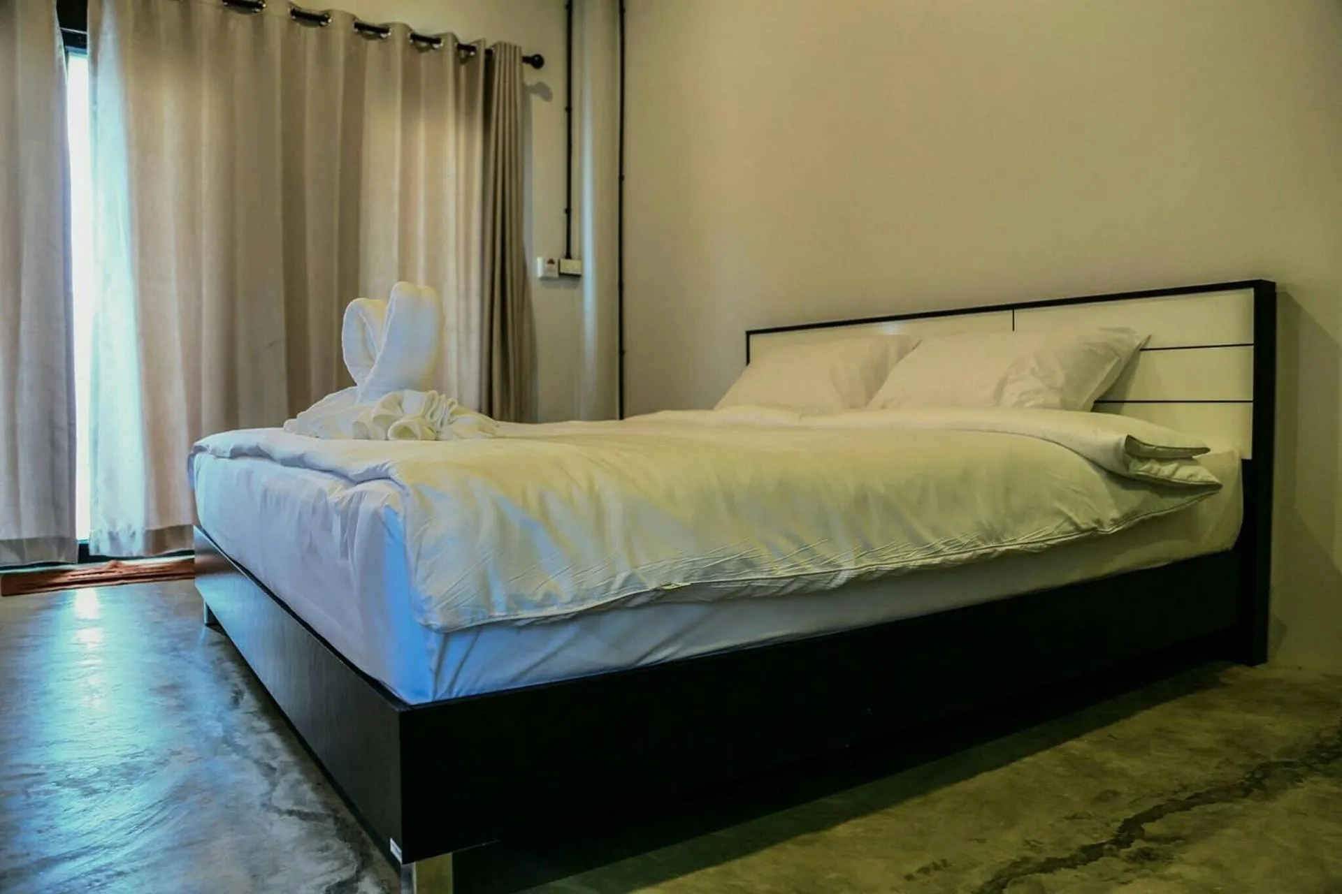 Bed in The Ele Hotel Ranong - SHA Extra Plus