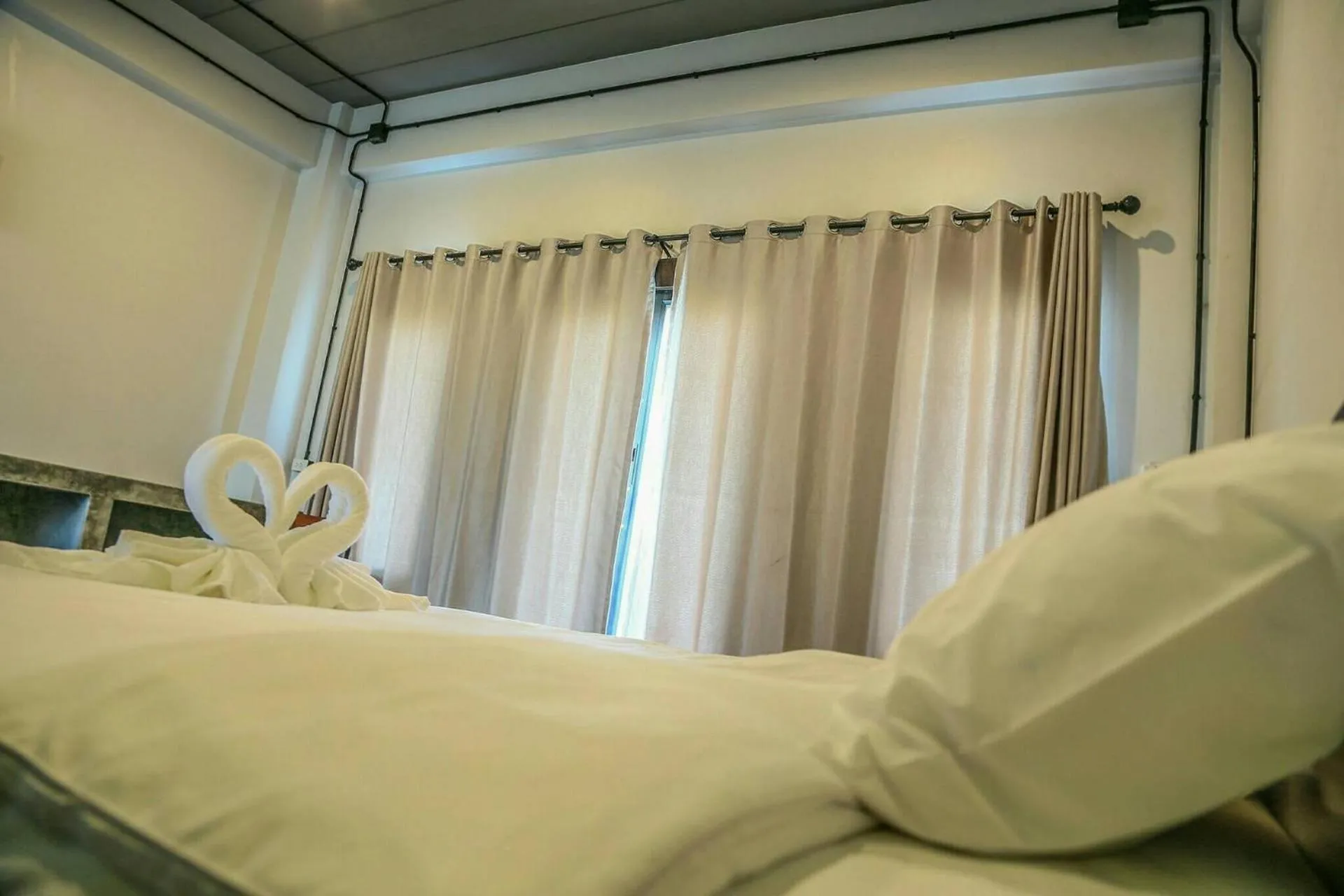 Bed in The Ele Hotel Ranong - SHA Extra Plus