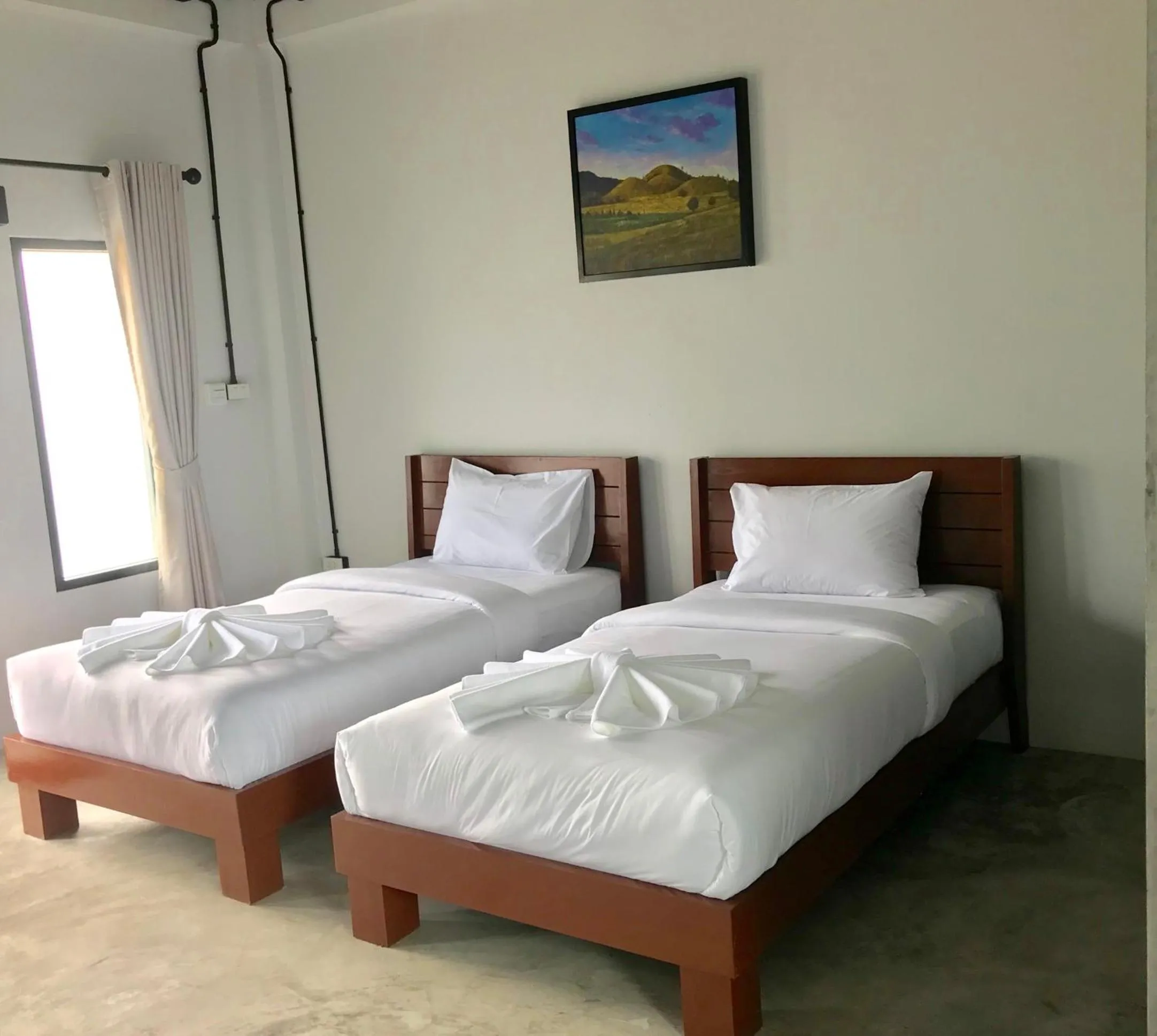 Bed in The Ele Hotel Ranong - SHA Extra Plus