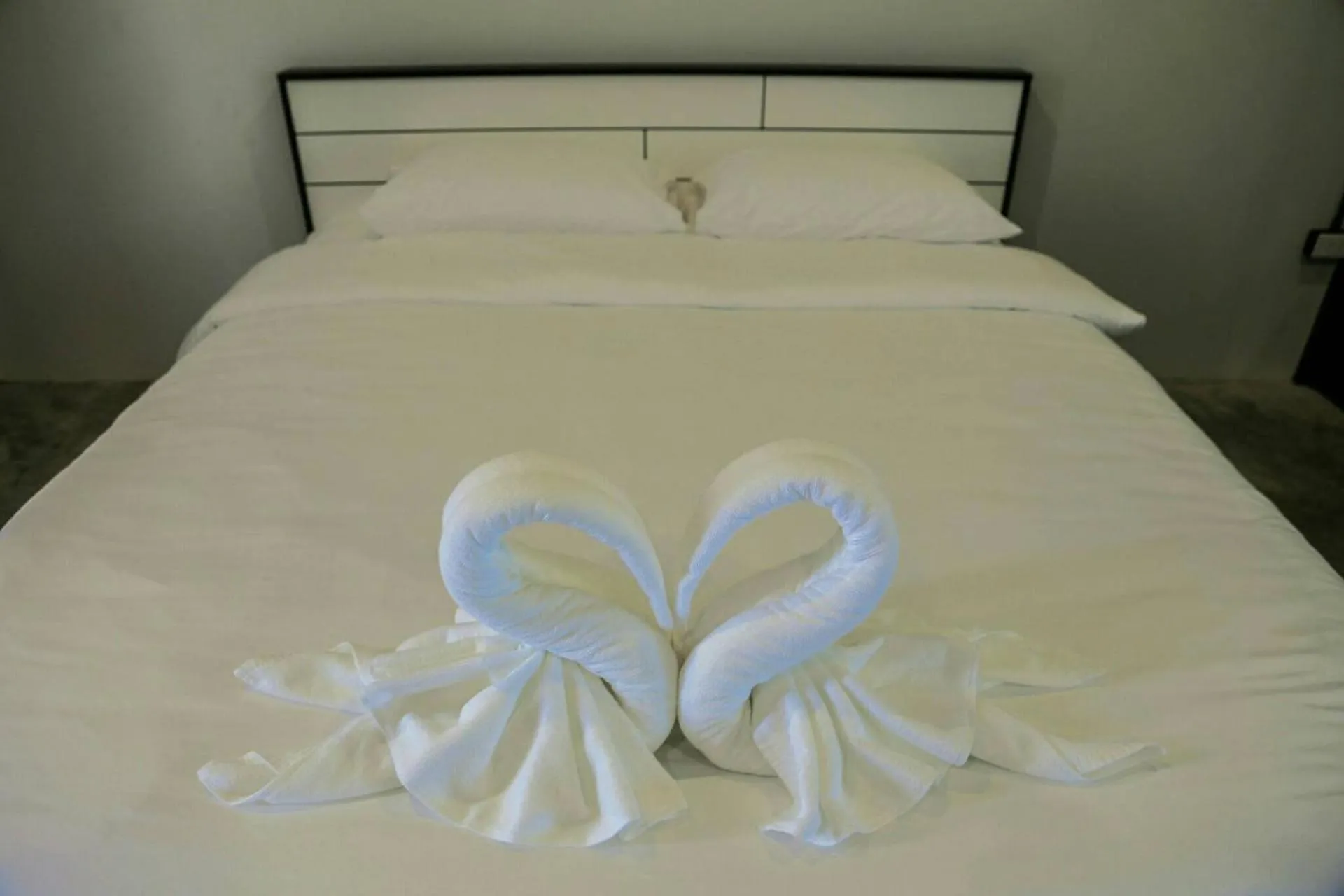 Bed in The Ele Hotel Ranong - SHA Extra Plus