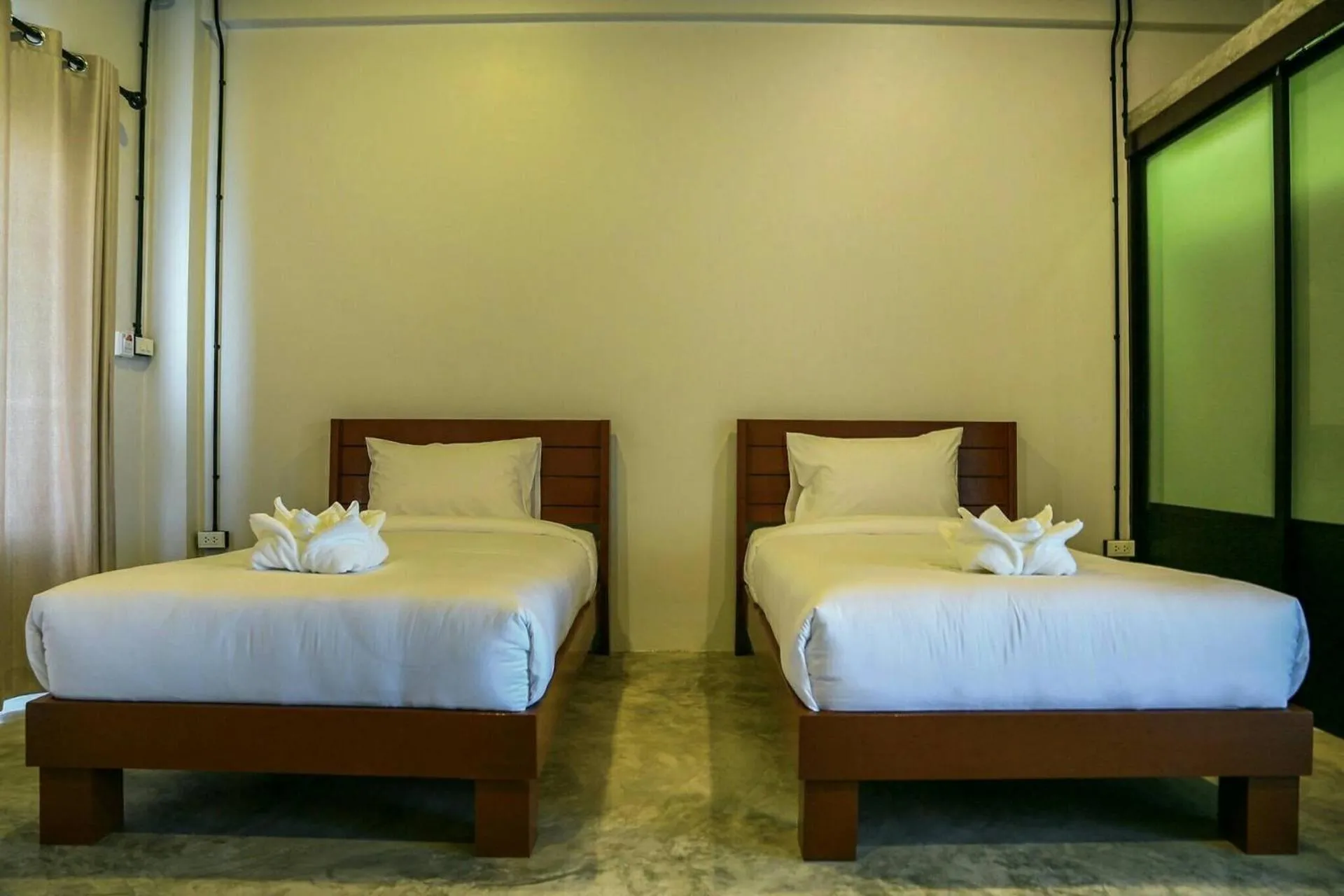Bed in The Ele Hotel Ranong - SHA Extra Plus