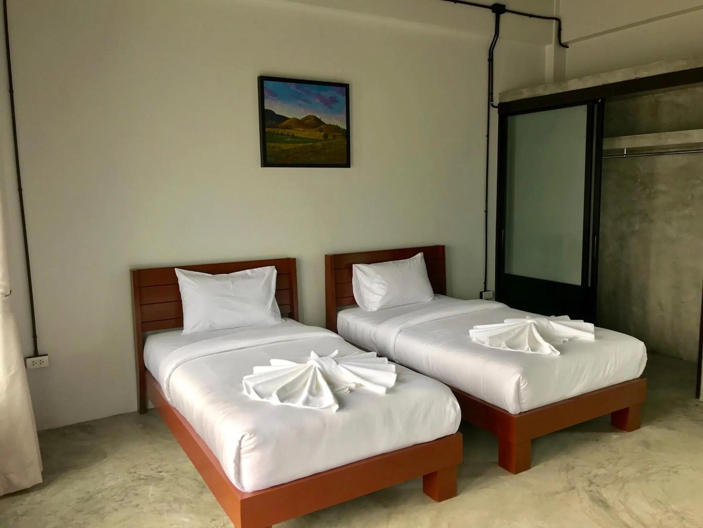Bed in The Ele Hotel Ranong - SHA Extra Plus