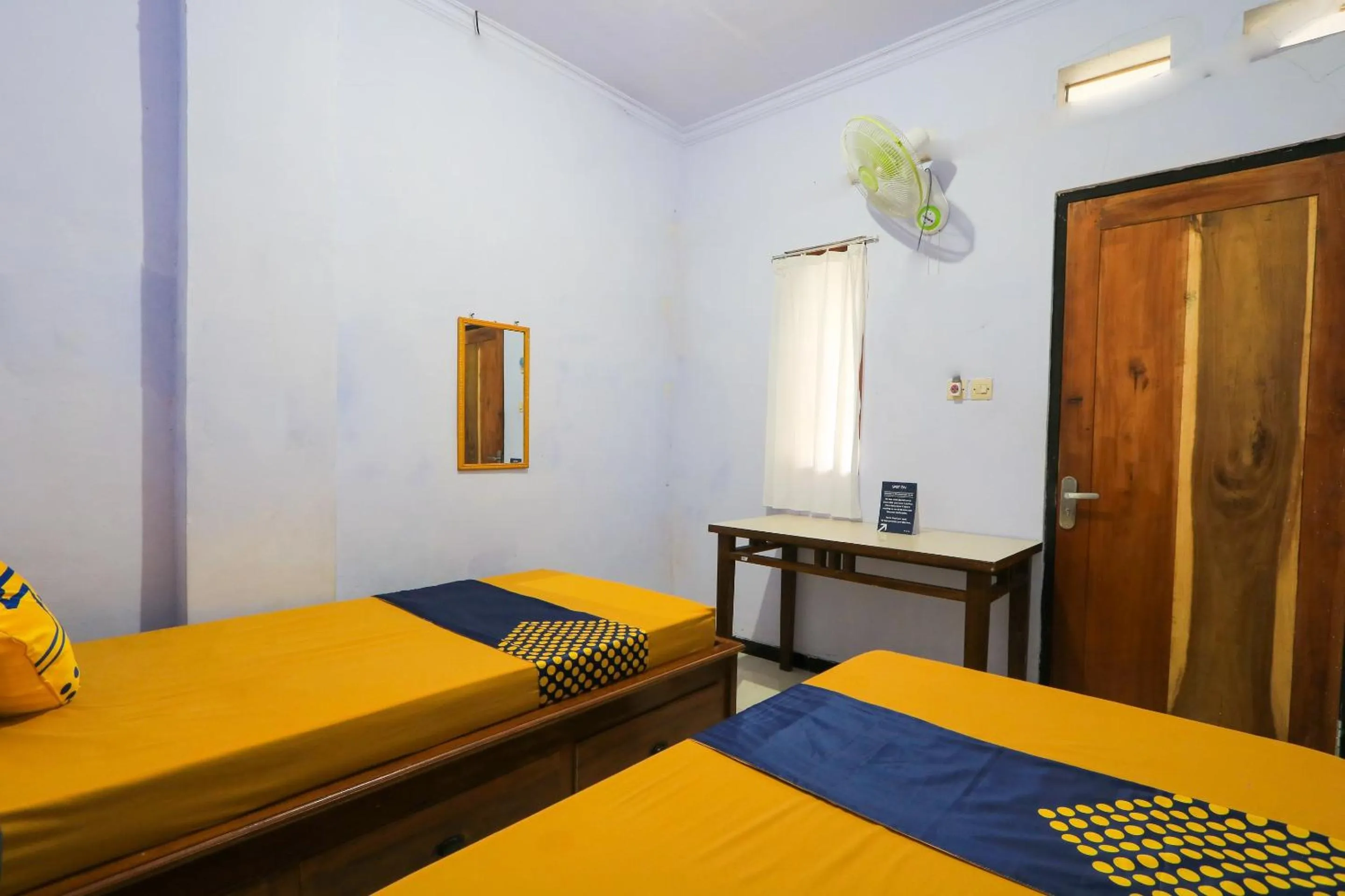 Bedroom in OYO 2497 Pesona Guest House