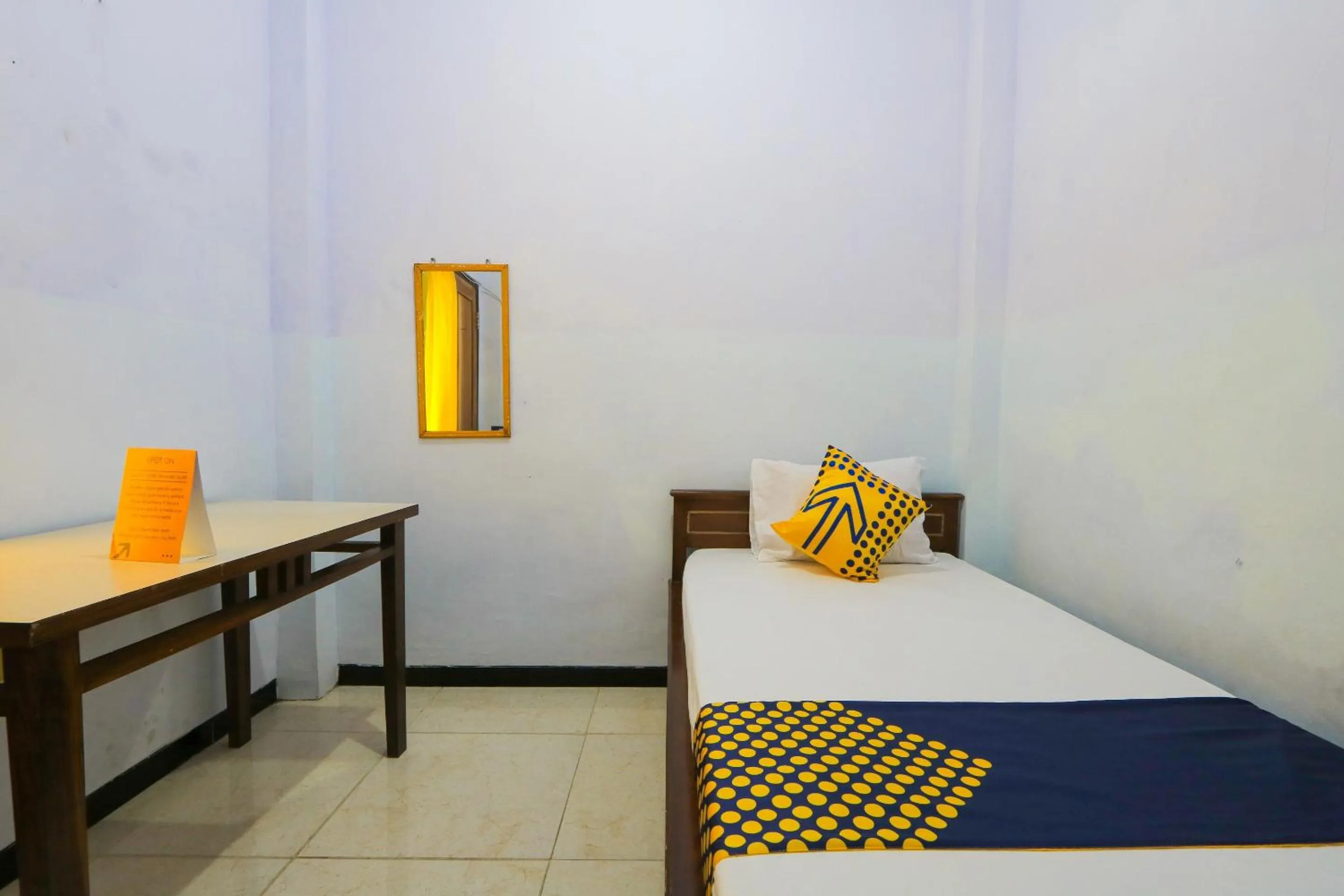Bedroom in OYO 2497 Pesona Guest House