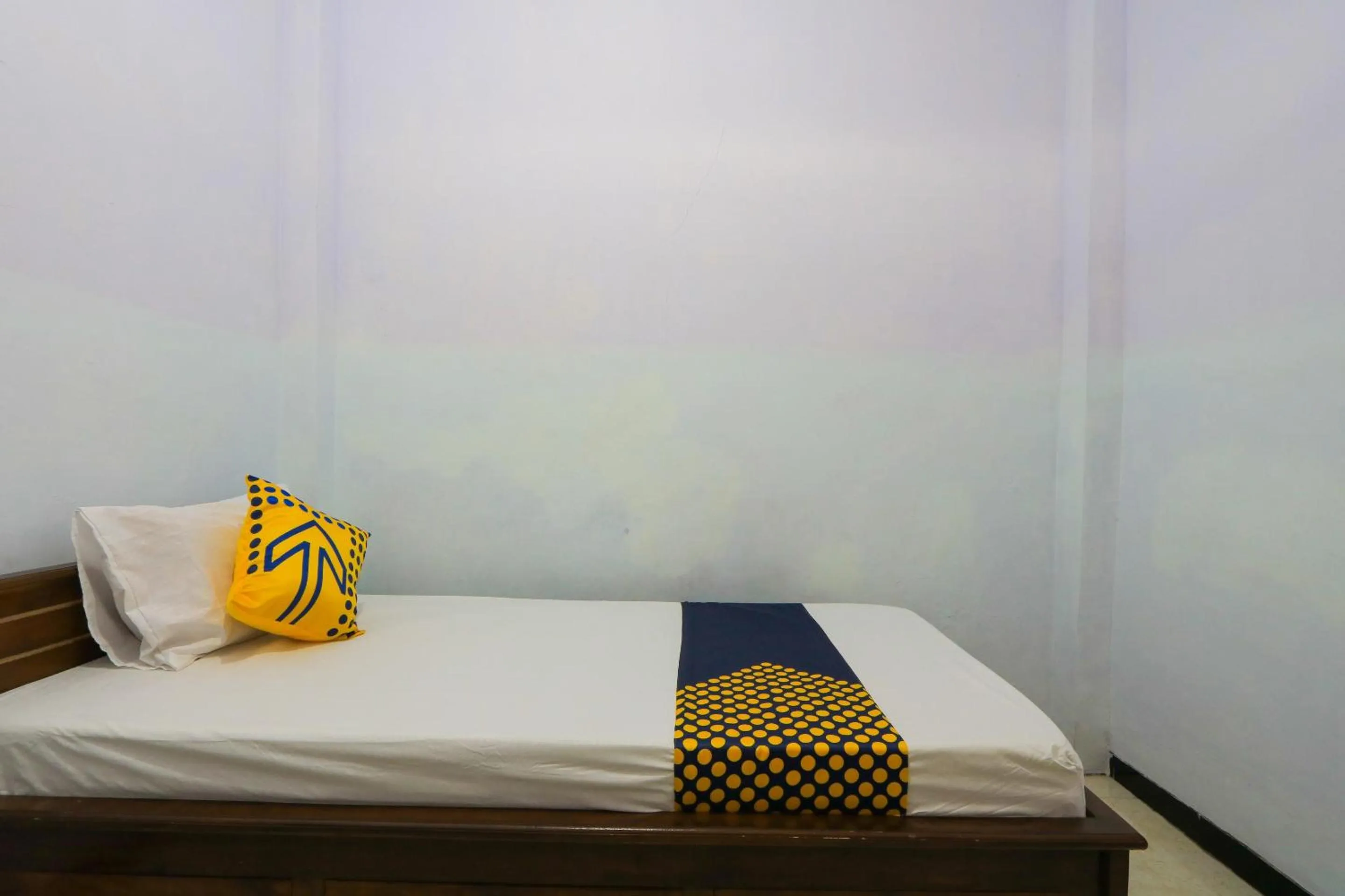 Bedroom in OYO 2497 Pesona Guest House