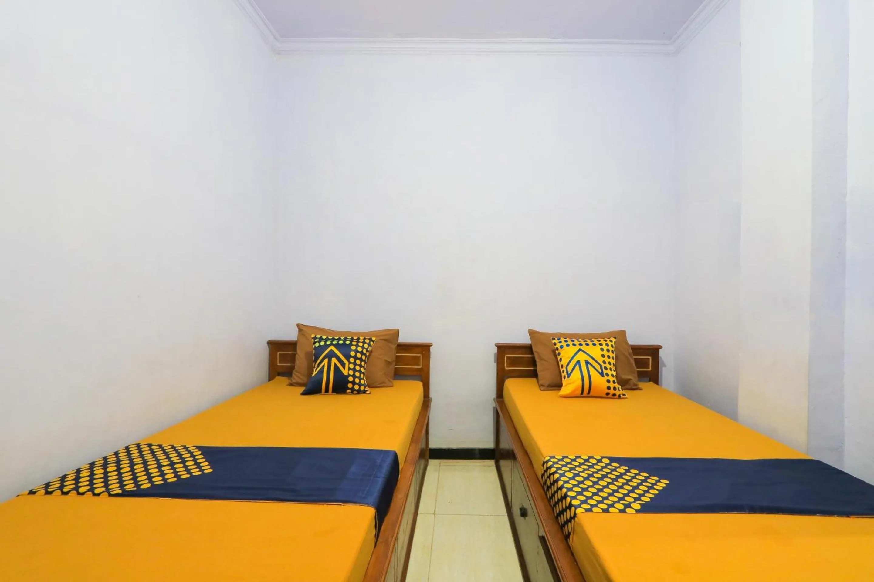 Bedroom in OYO 2497 Pesona Guest House